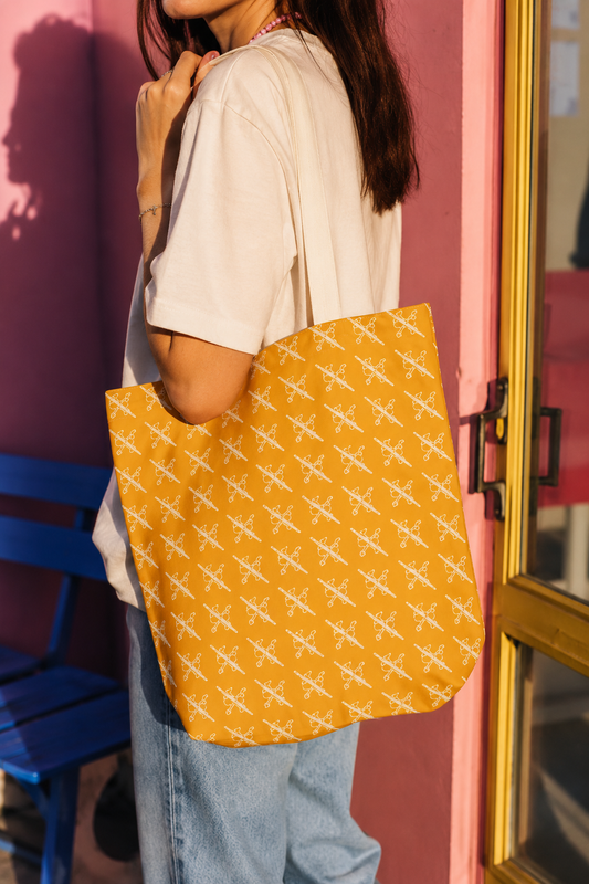 Proudly Childless Tote Bag Yellow carried by a woman in an editorial lifestyle mockup with warm cinematic lighting and a pink background.