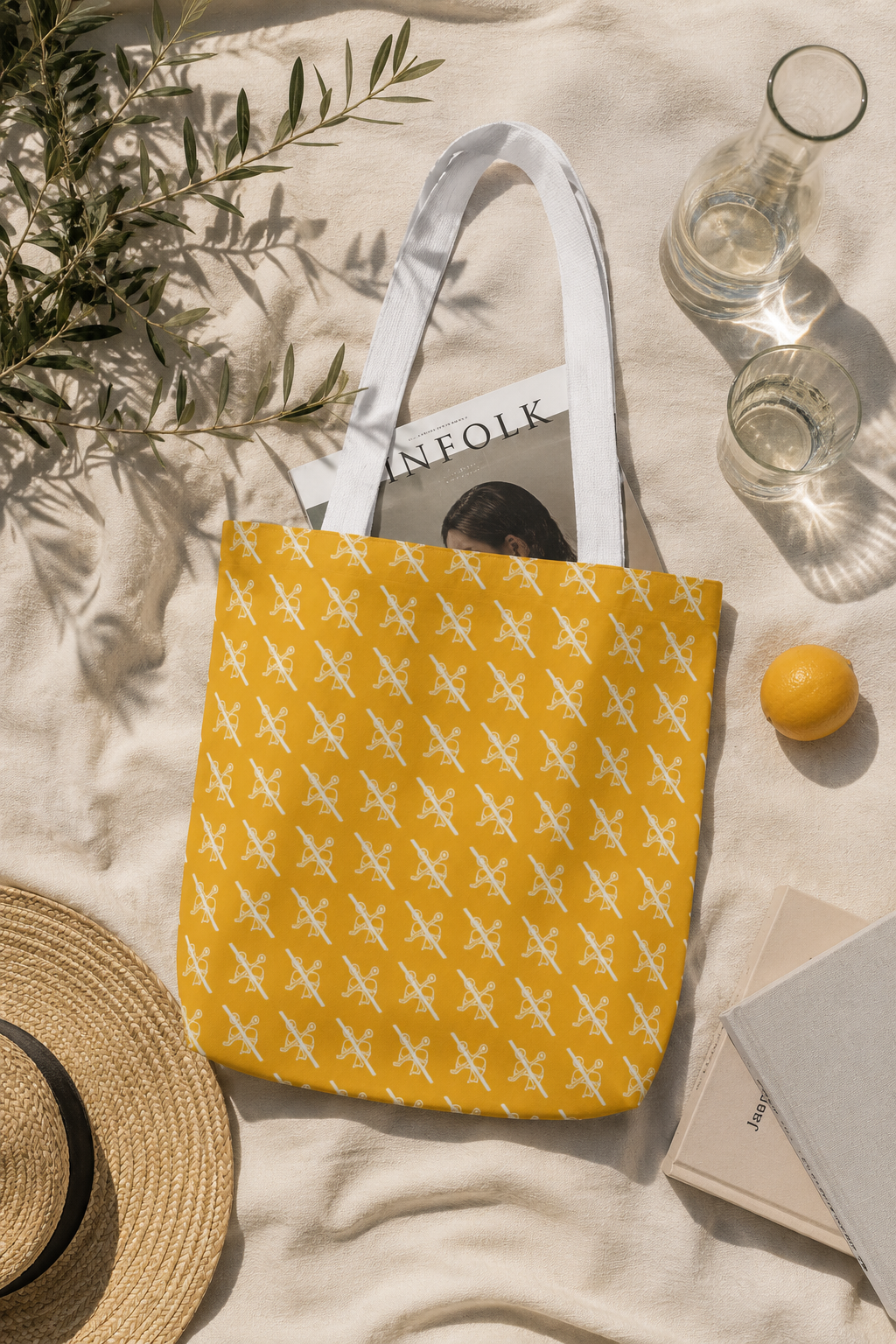 Proudly Childless Tote Bag Yellow in a cinematic flat lay mockup surrounded by books, a hat, lemon, and glassware on a soft neutral background.