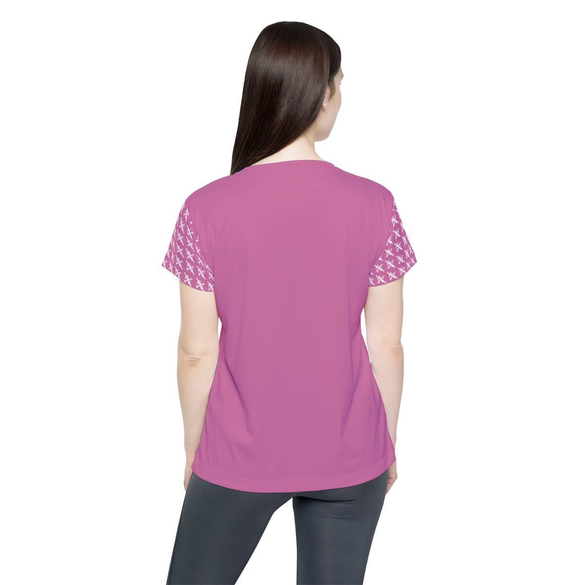 Back view of the pink Proudly Childless Women’s Jersey in a fitted activewear style