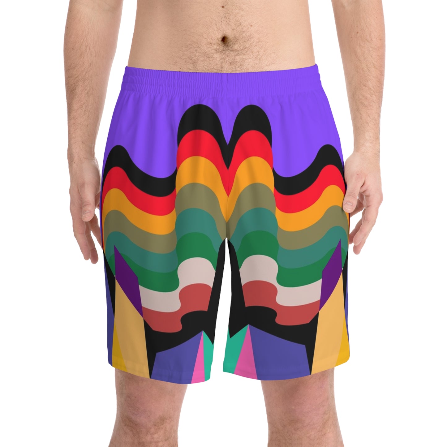 Model wearing colorful psychedelic swim shorts with retro-inspired wave graphics