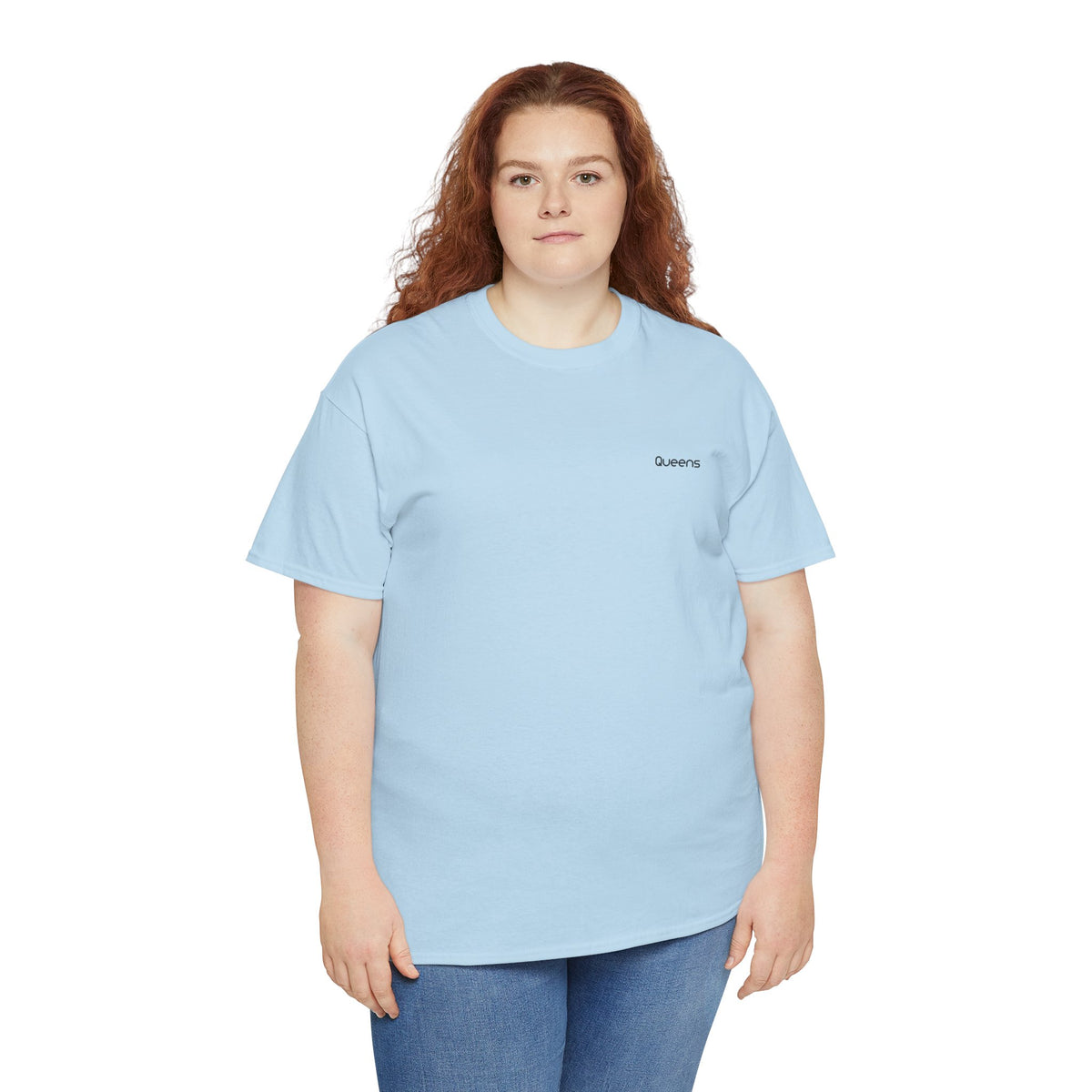 Woman modeling a light blue Queens T-shirt with short sleeves and blue jeans.