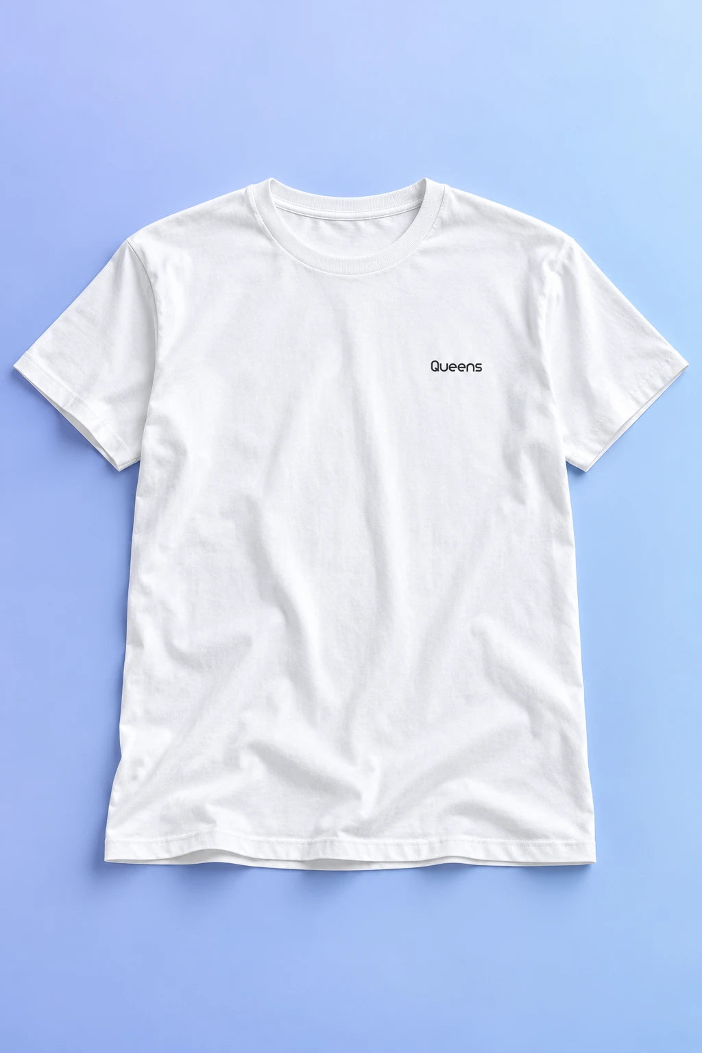 White Queens T-shirt laid flat on a pastel blue and periwinkle gradient background.