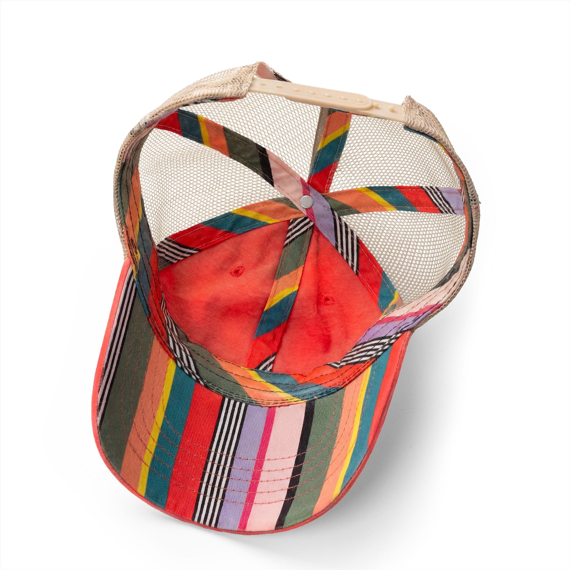 Interior view of rainbow striped vintage trucker hat.