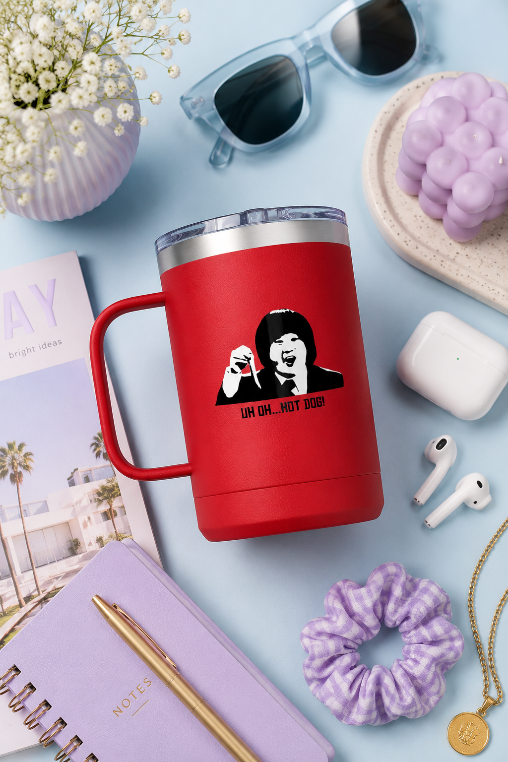 Red Uh Oh Hot Dog MADtv insulated travel mug styled with sunglasses and colorful pastel accessories