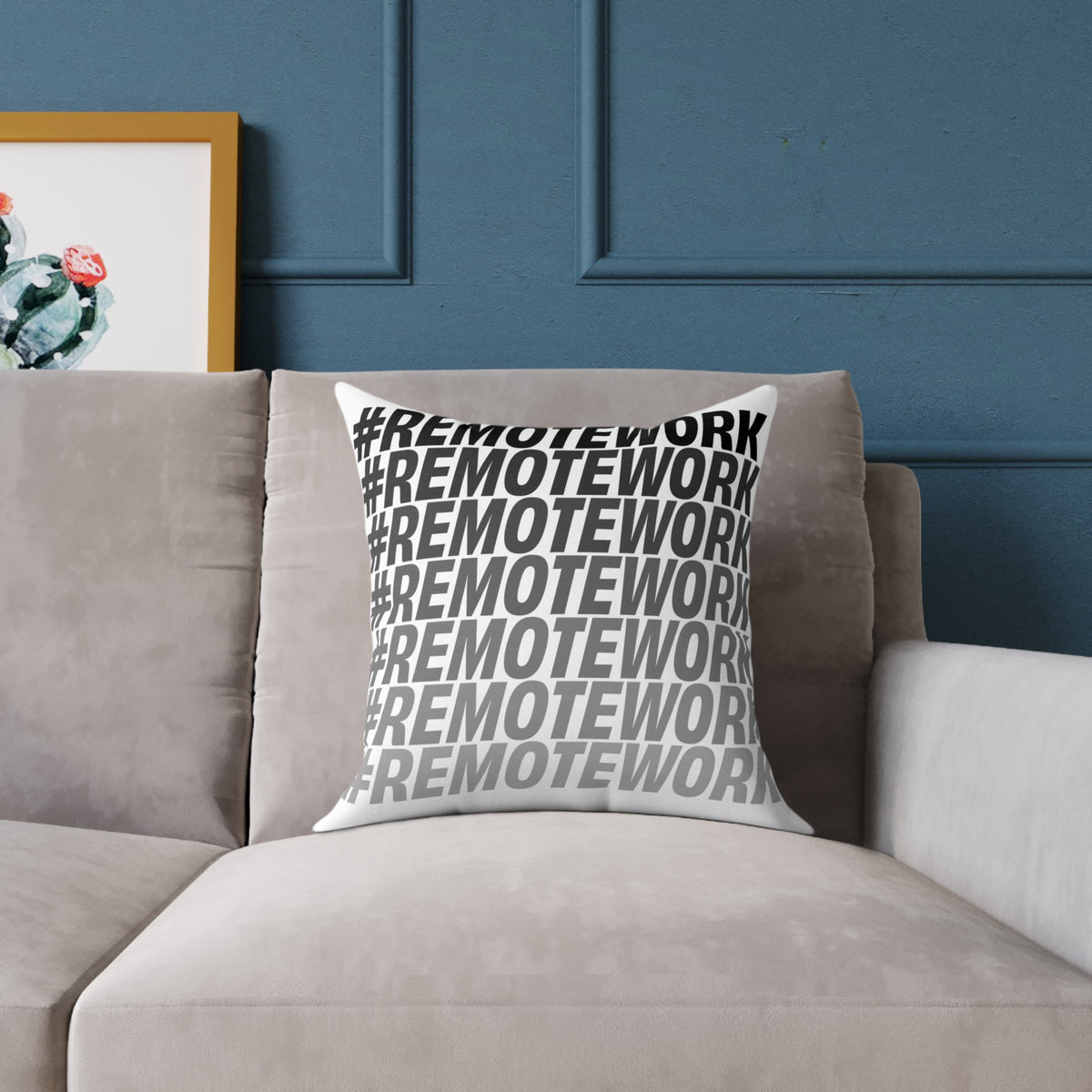 Remote Work typography throw pillow styled on a neutral sofa in a modern living room
