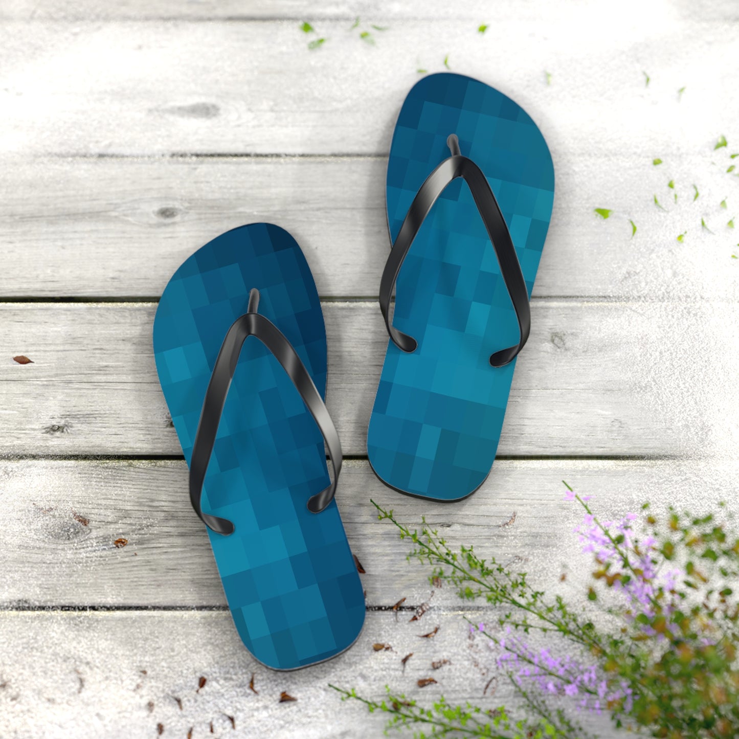 Blue retro gaming flip flops photographed on rustic wood surface with soft natural summer lighting