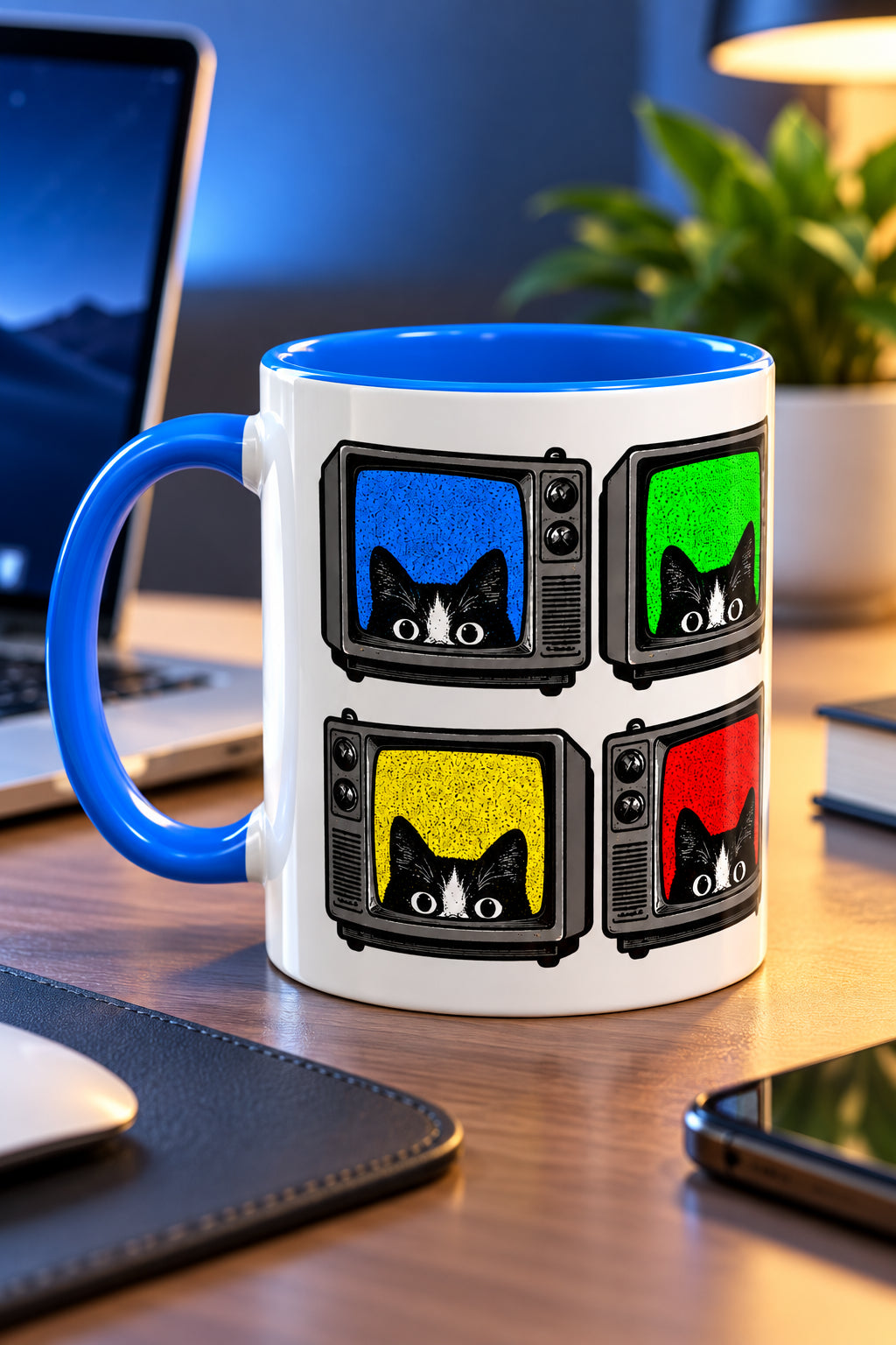 Retro Cat TV 15 oz mug with blue handle in a modern tech workspace