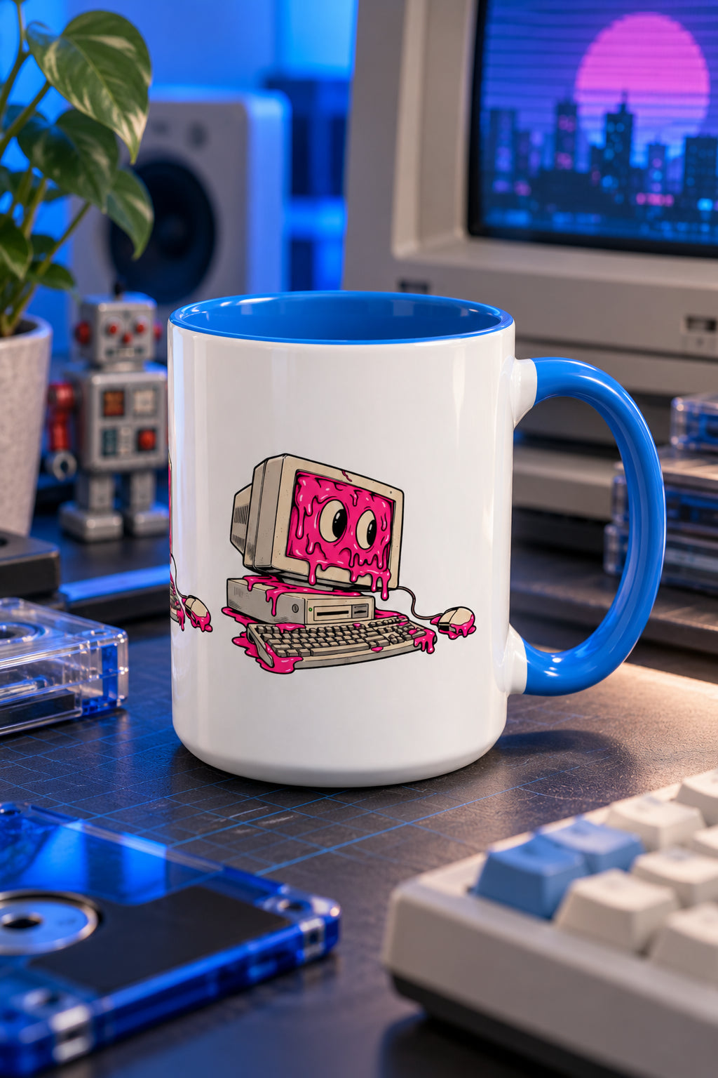 Blue retro computer slime mug on a tech desk with vintage computer and electronics