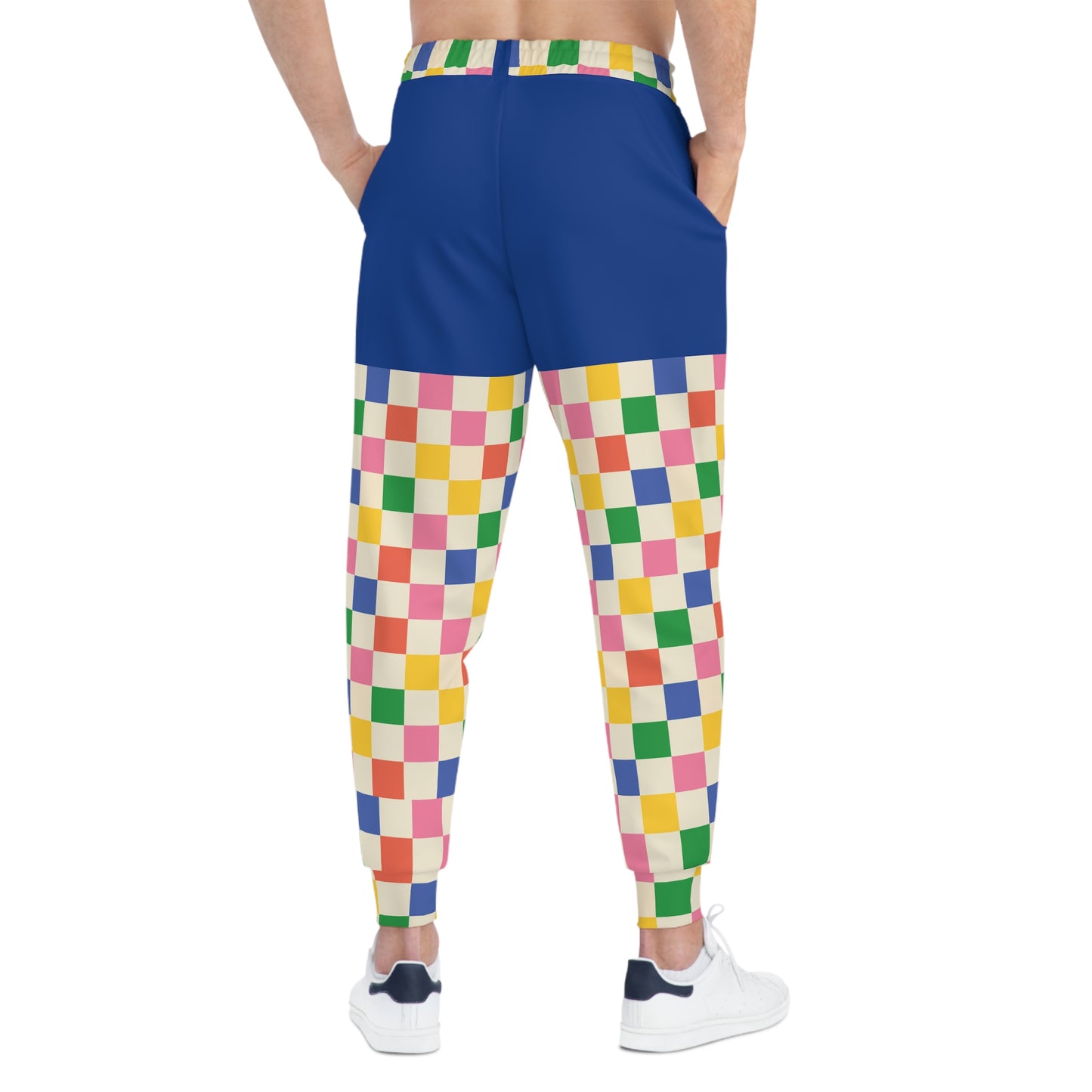 Angled rear view of Retro Pop Joggers highlighting checkerboard pattern, soft fabric drape, and colorful gaming-inspired design.