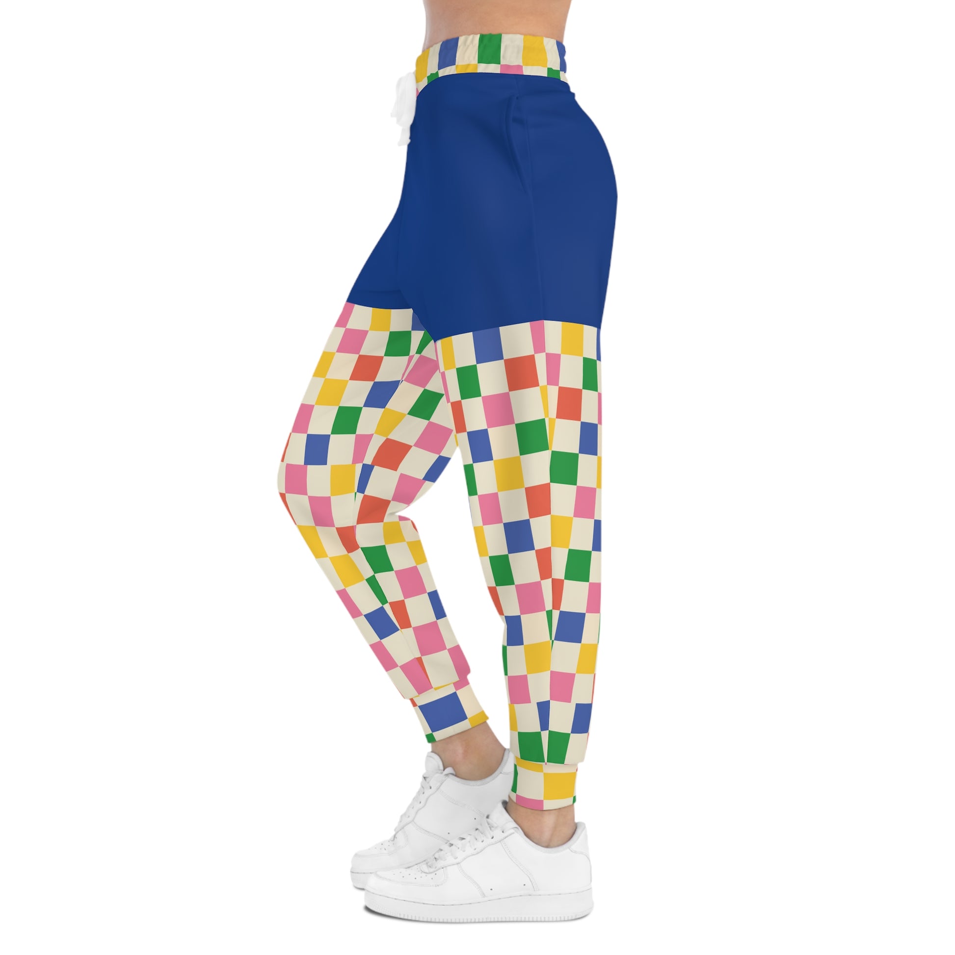 Side profile of Retro Pop Joggers showing colorful checkerboard pattern, athletic silhouette, and retro-inspired streetwear styling.