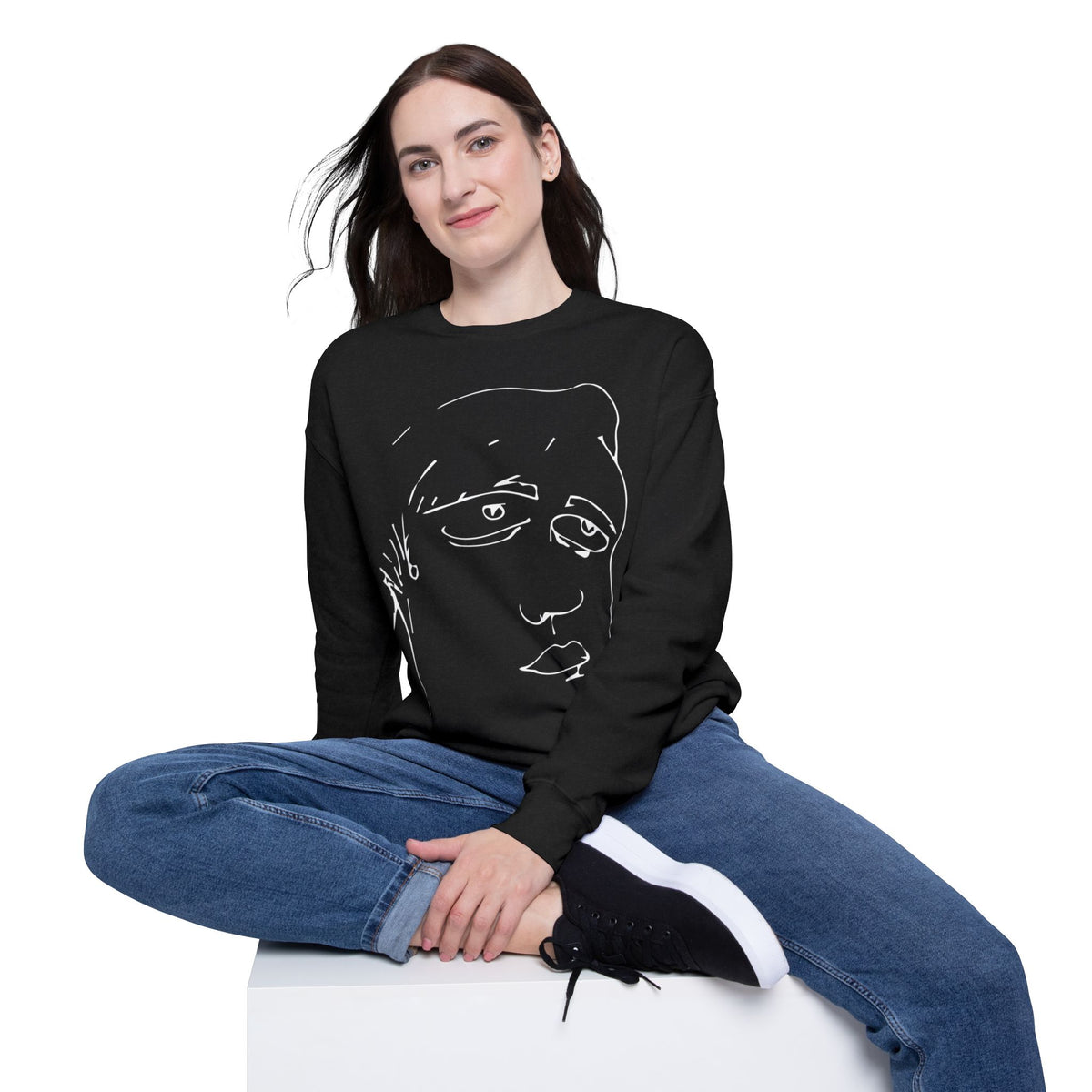 Woman wearing the Roger black sweatshirt with original hand-drawn abstract face graphic.