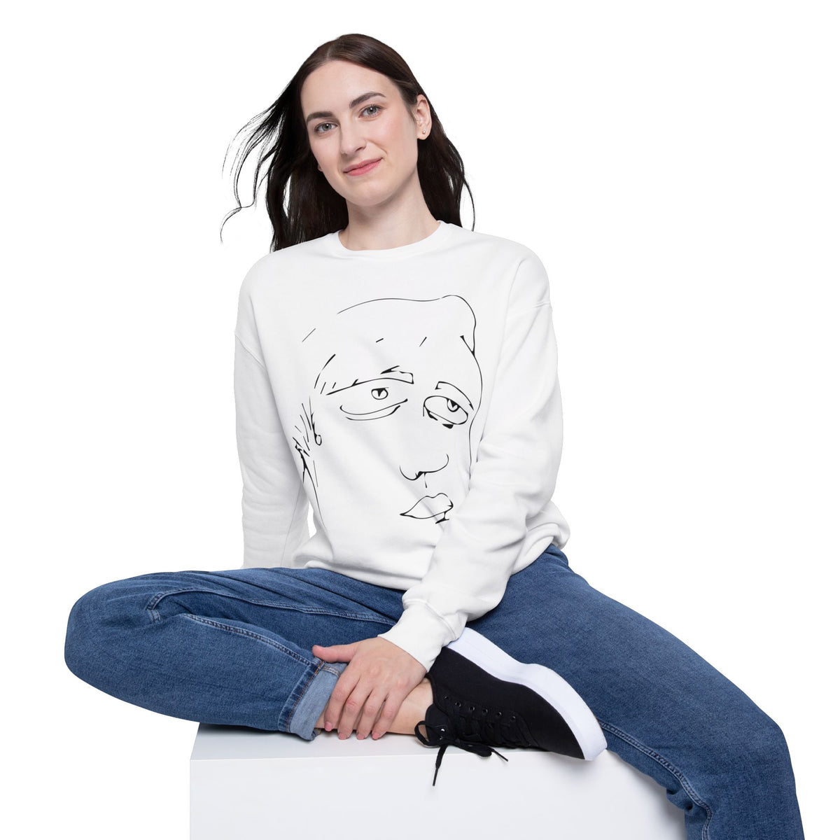 Woman wearing the Roger white sweatshirt with original hand-drawn abstract face graphic.