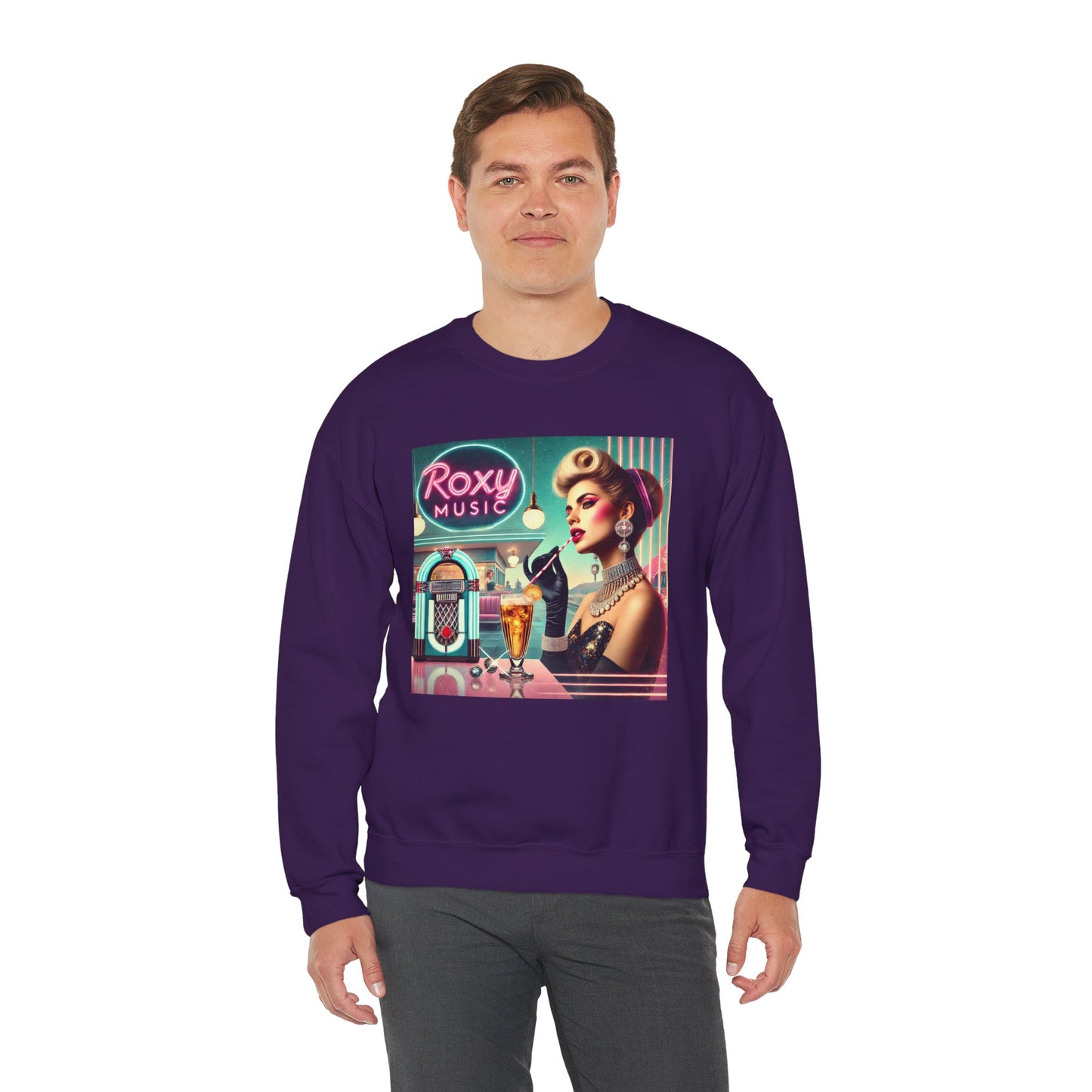 Man wearing a purple Roxy Music nostalgia sweatshirt with retro music inspired graphic.