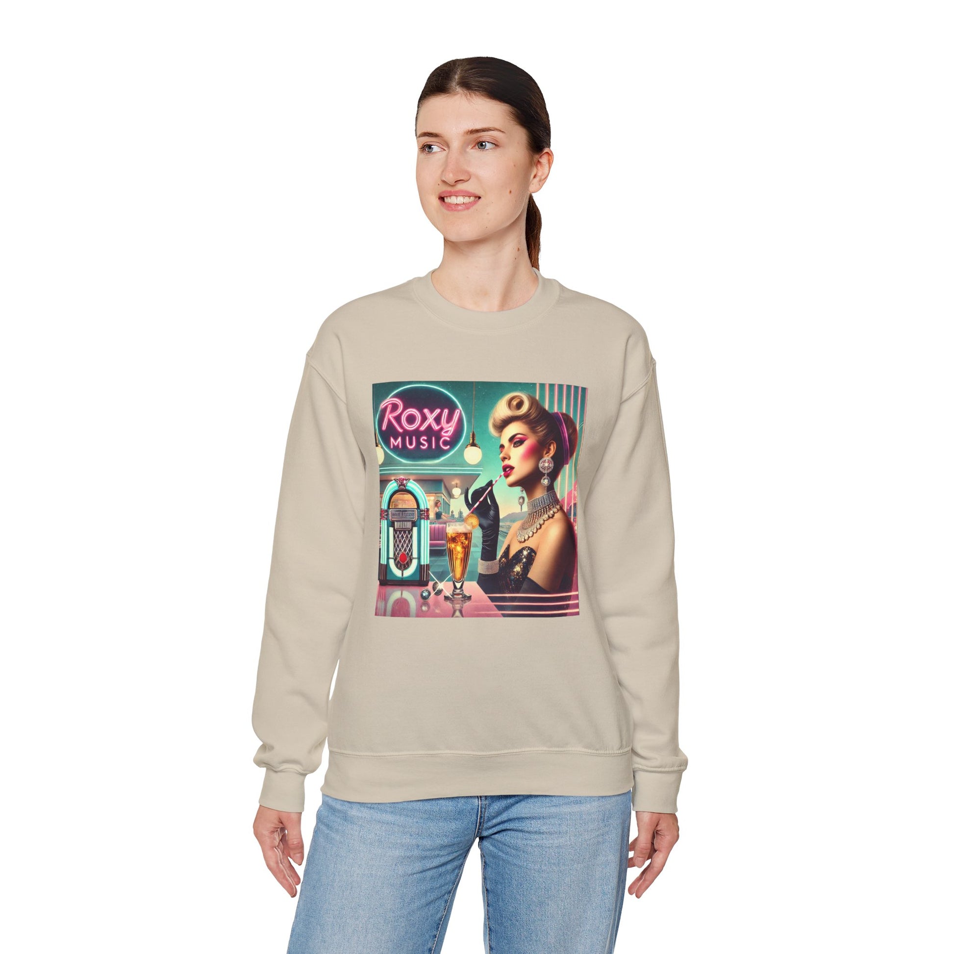 Woman wearing a sand Roxy Music nostalgia sweatshirt with retro music graphic.