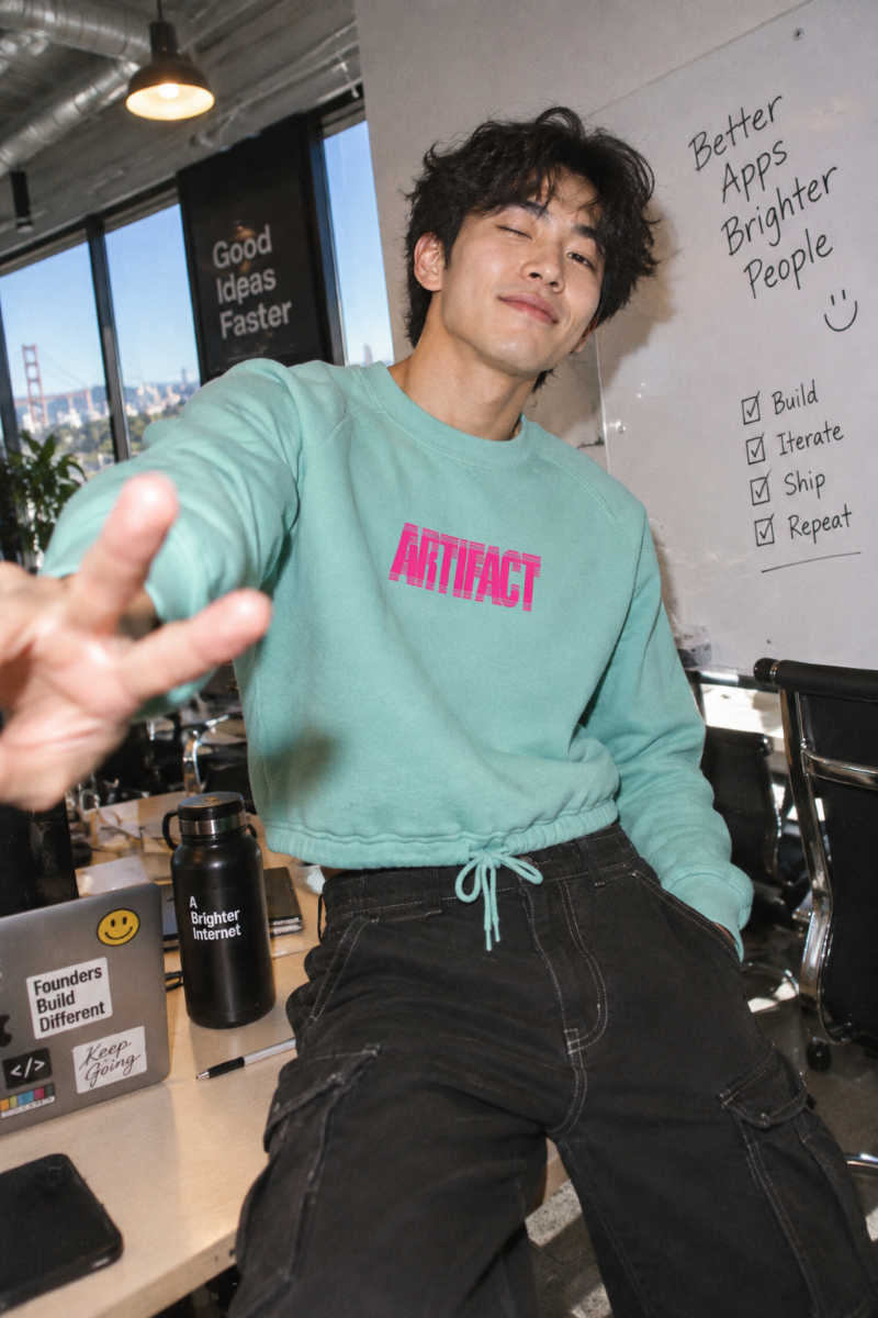Gen Z man wearing saltwater Artifact Women’s Boxy Fleece Crewneck sweatshirt in Silicon Valley tech office