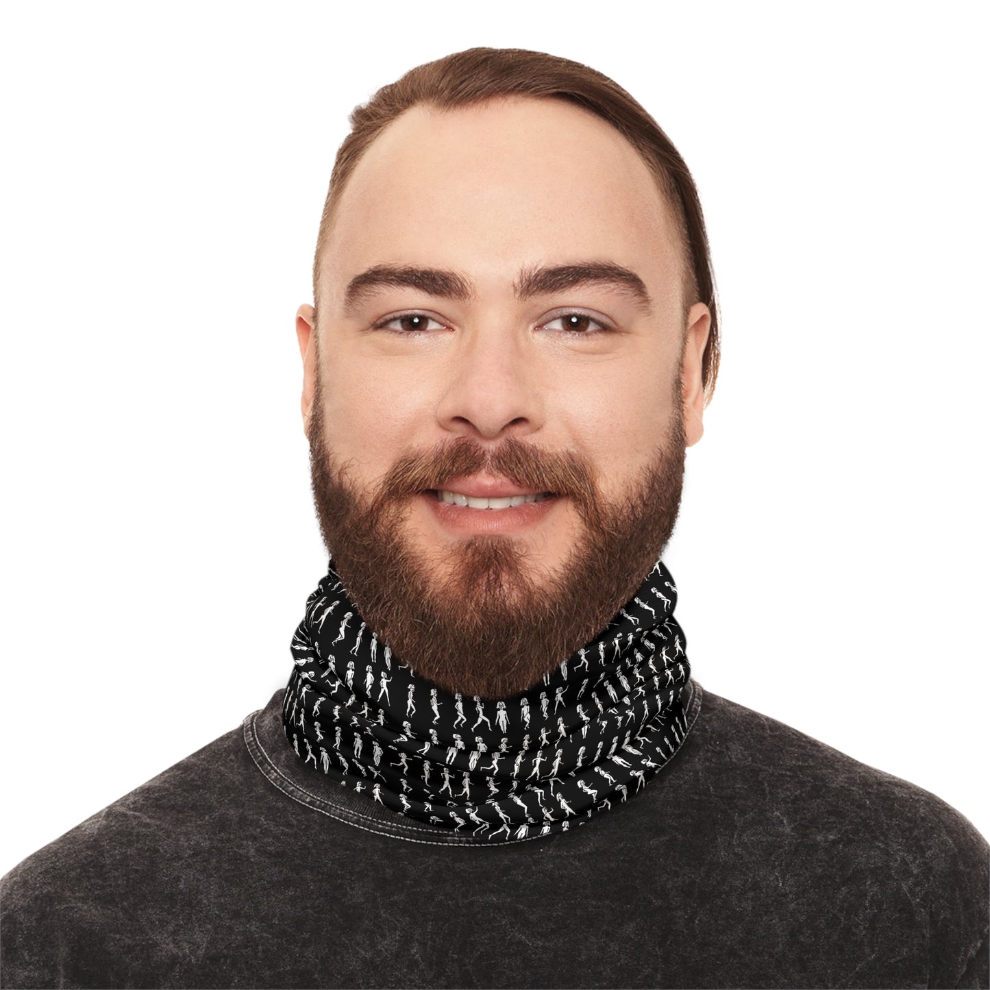 Male model wearing black Running Out unisex neck gaiter with minimalist motion art design.