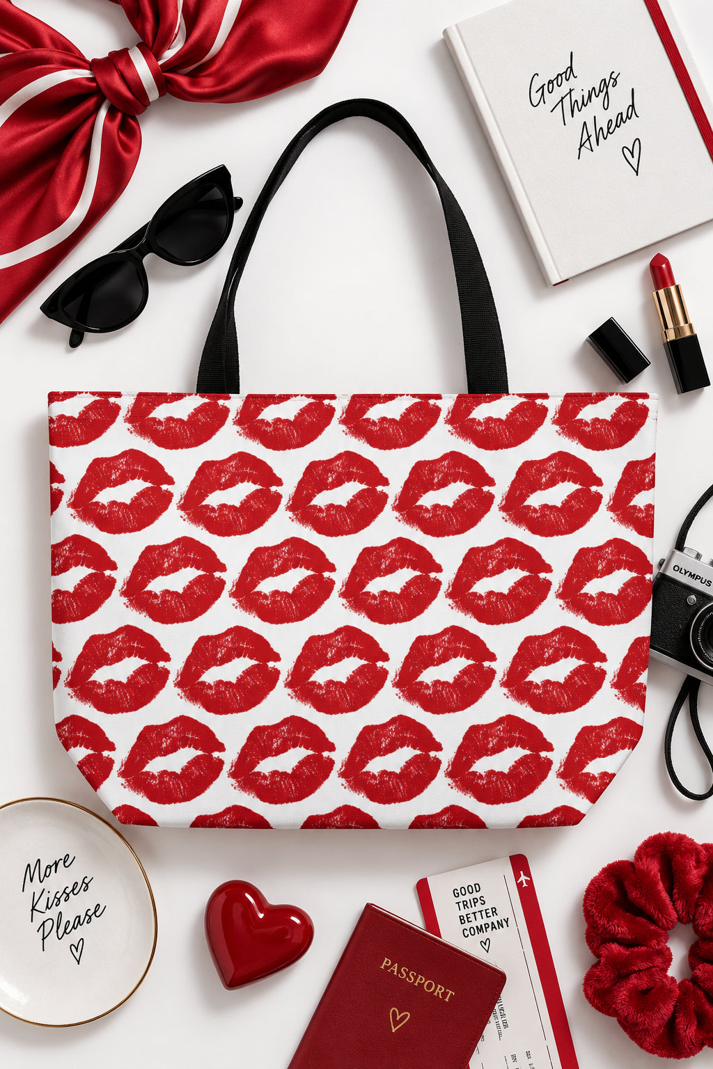 Smooch red lips weekender travel bag flat lay with fashion and travel accessories
