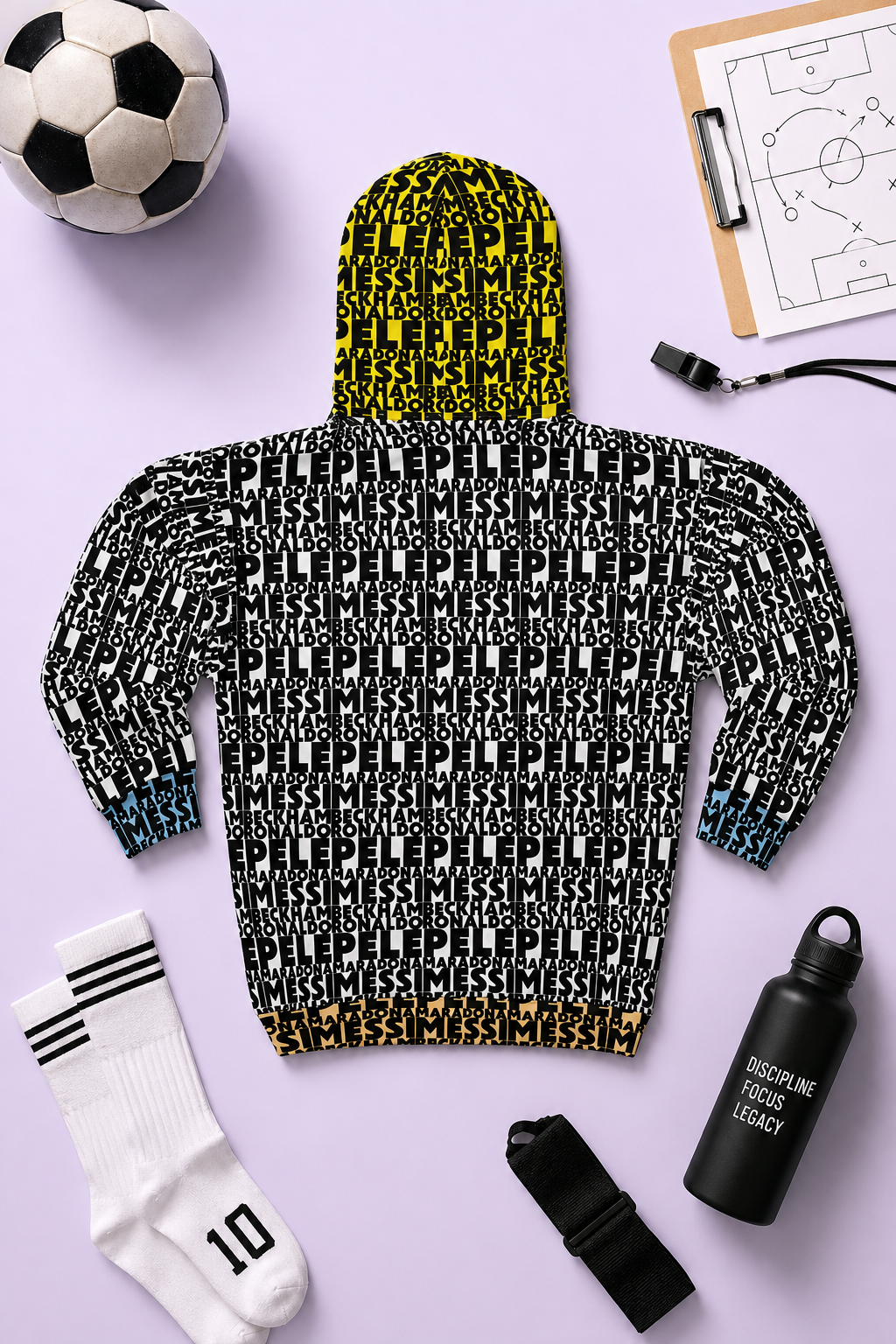 Back-view flat lay of the Soccer Legends zip hoodie with sports accessories on a light lavender background