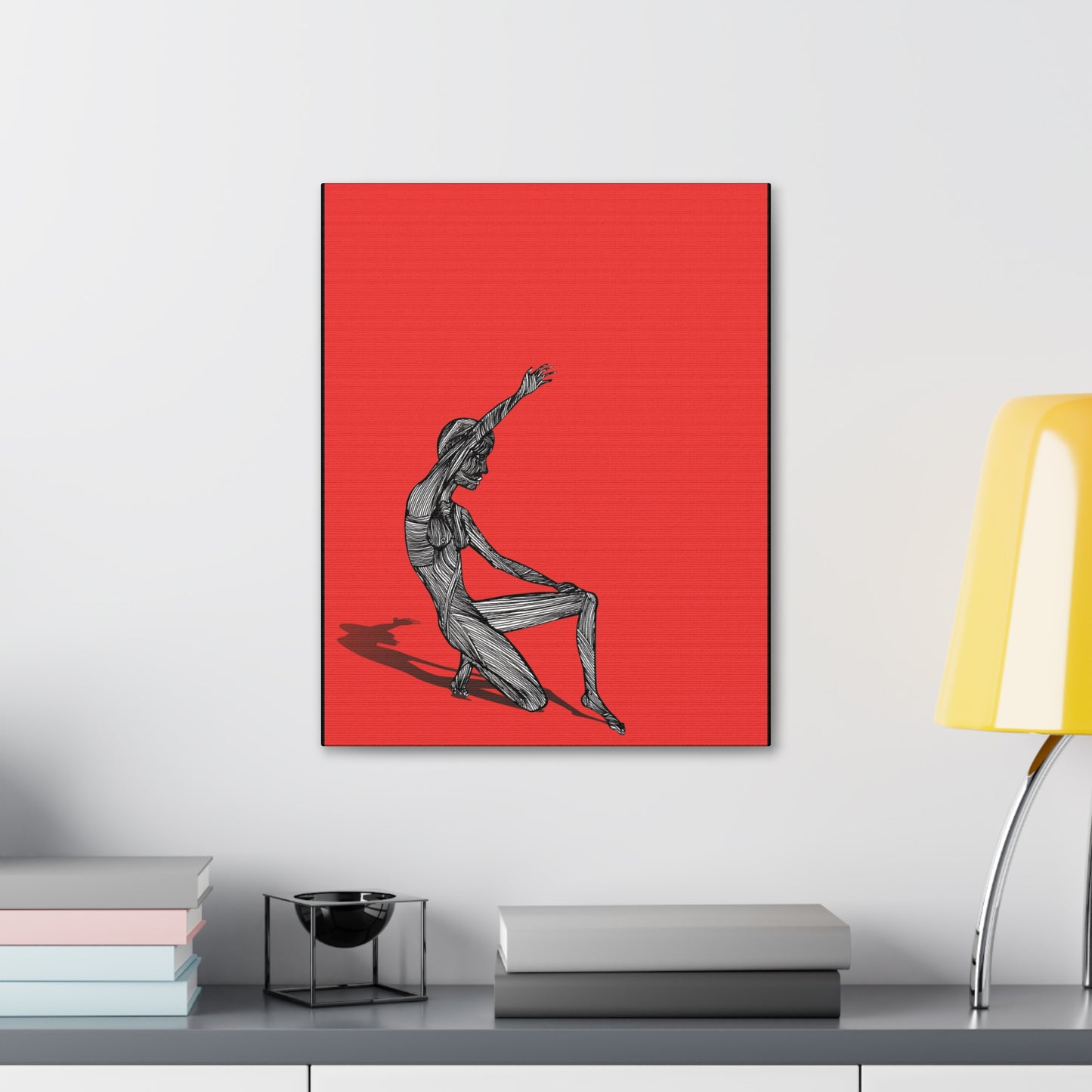 “Stripped” red figurative canvas wall art styled in a bright minimalist interior