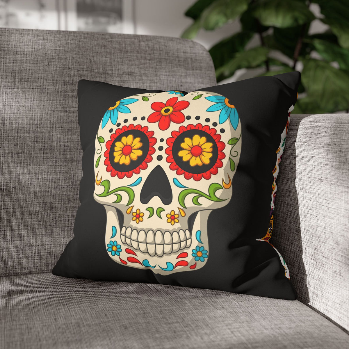 Black sugar skull faux suede throw pillow cover styled on a gray sofa