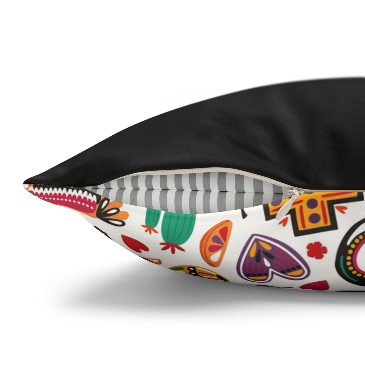 Close-up of concealed zipper on colorful sugar skull faux suede pillow cover