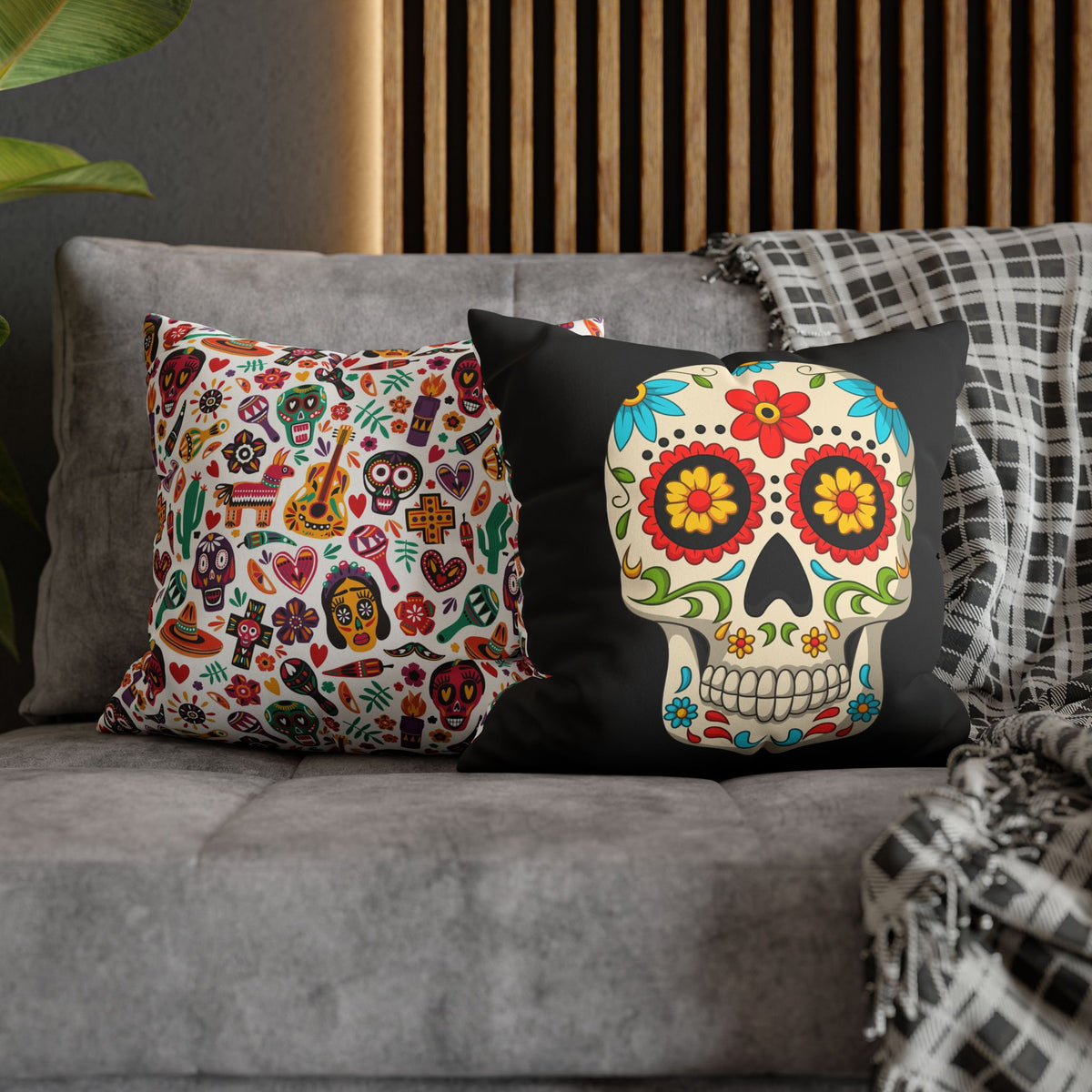Colorful 16 x 16 sugar skull faux suede pillow covers styled on a modern gray sofa