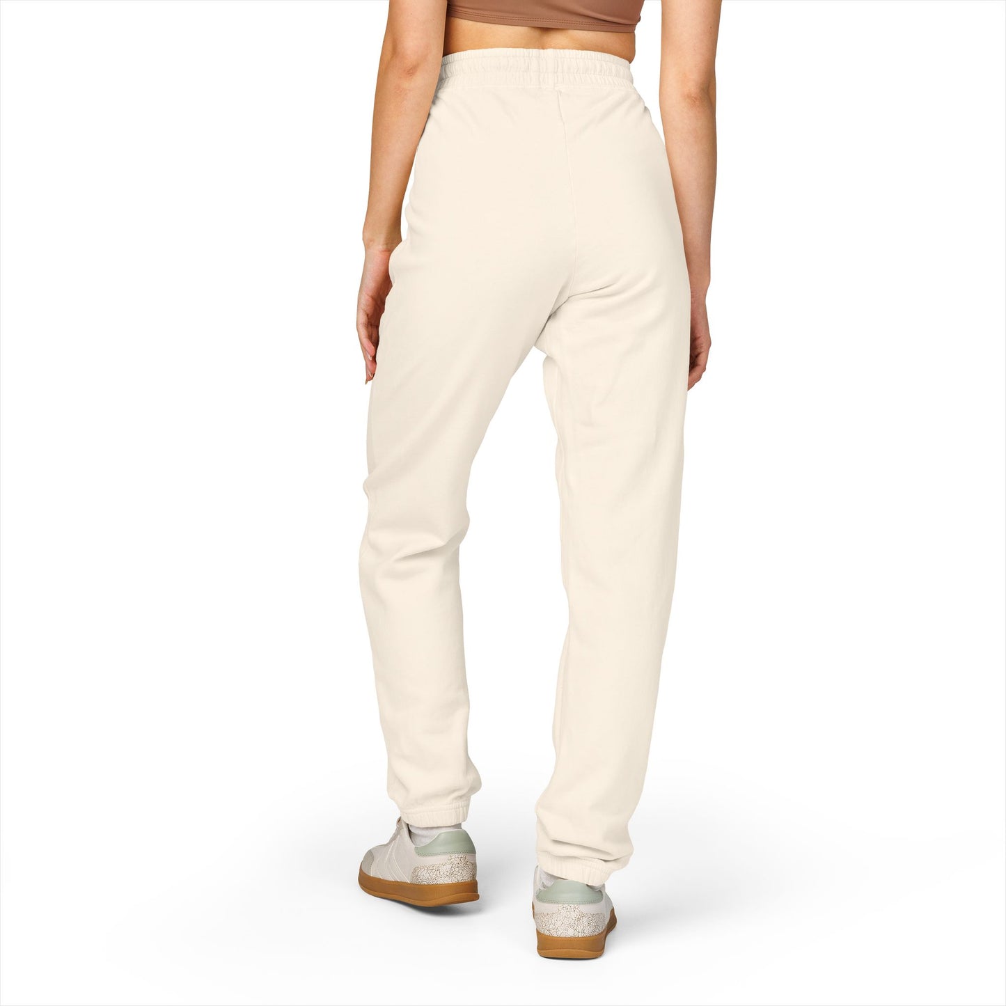 Back view of ivory Tantrum Media fleece sweatpants.