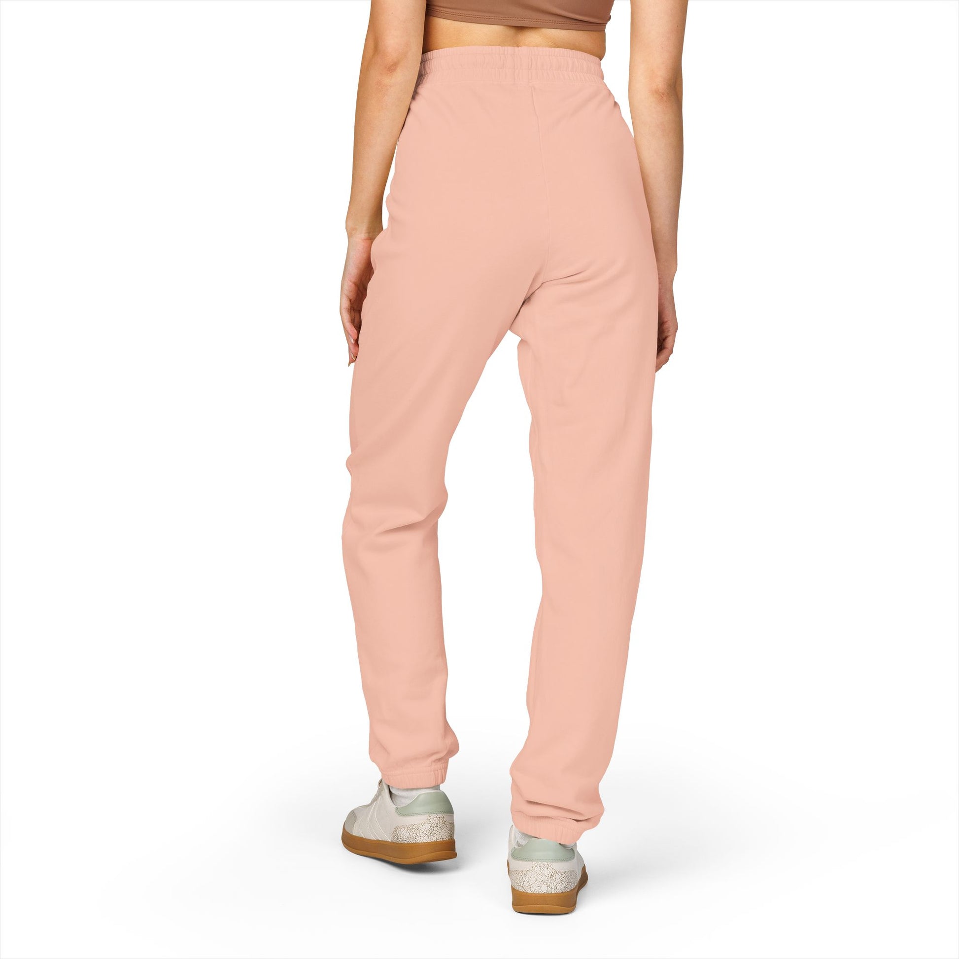 Tantrum Media Cozy Fleece Sweatpants in Peach worn from back by model