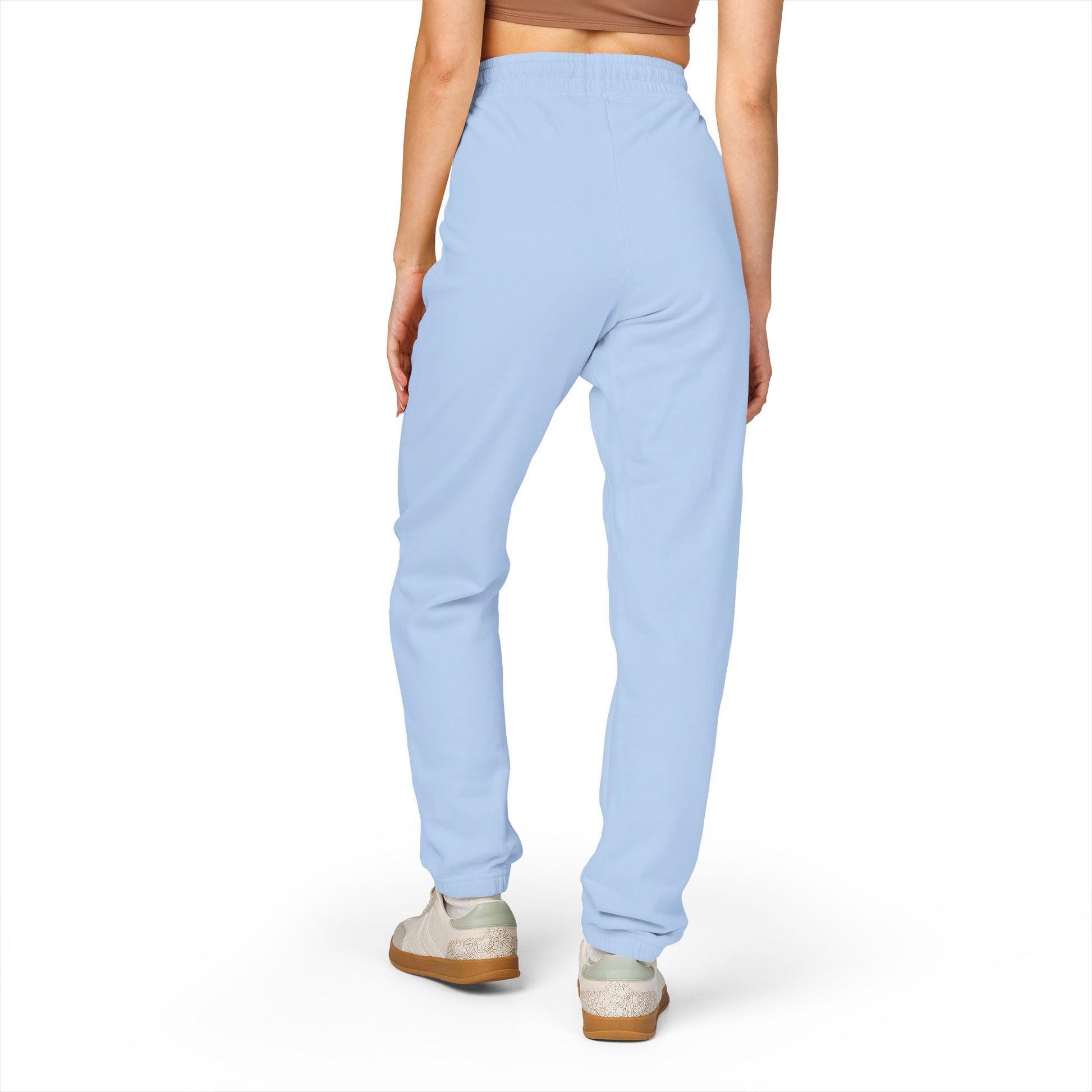 Female model wearing sky blue Tantrum Media fleece sweatpants.