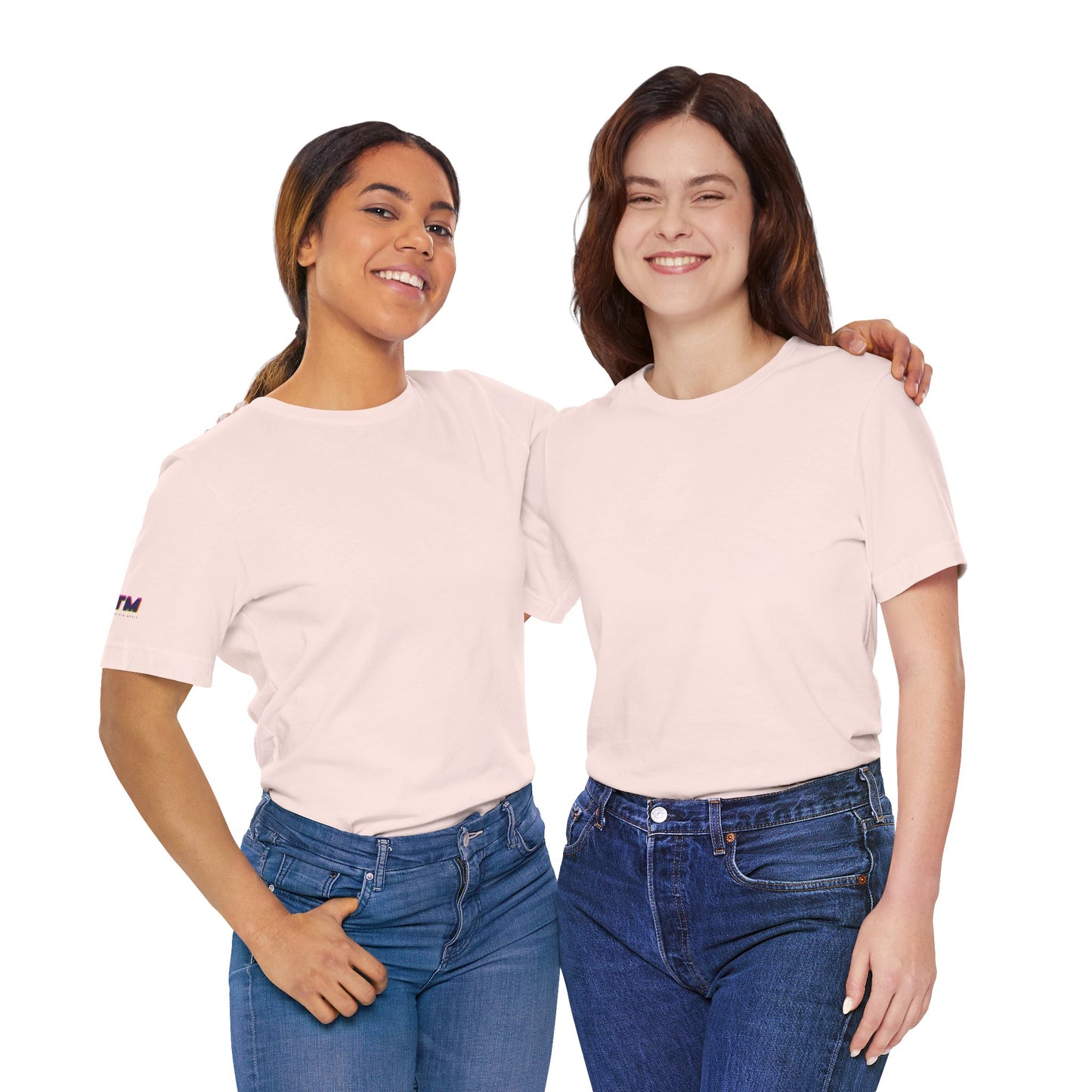 Two female models wearing Tantrum Media Soft Tones Plain Tee in light pink