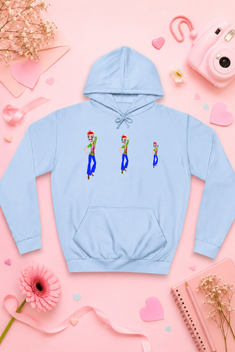 Light blue TeeMan graphic hoodie flat lay on a soft pink background with playful accessories.