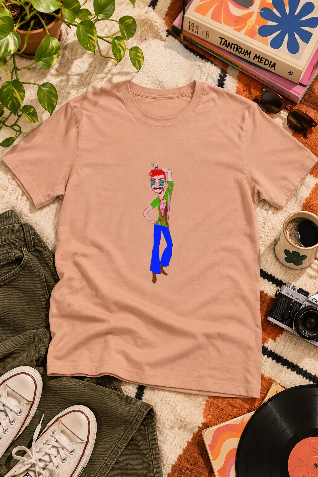 TeeMan men’s graphic T-shirt in peach with original character artwork, editorial flat lay