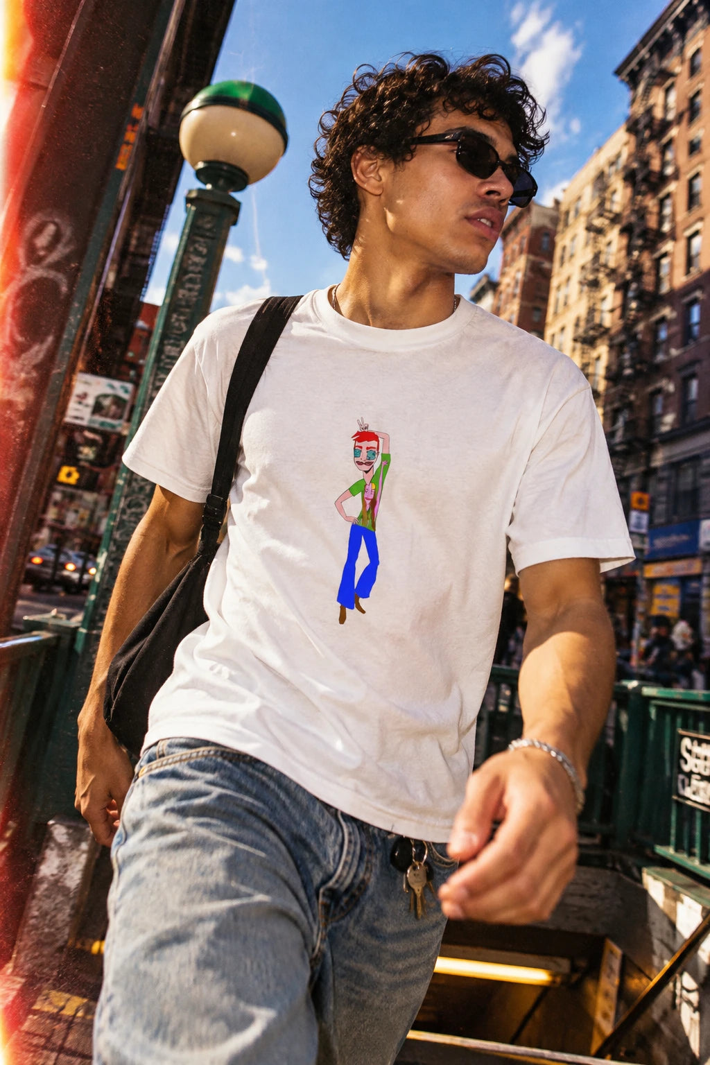Young man wearing the TeeMan men’s graphic T-shirt in white in an urban street setting