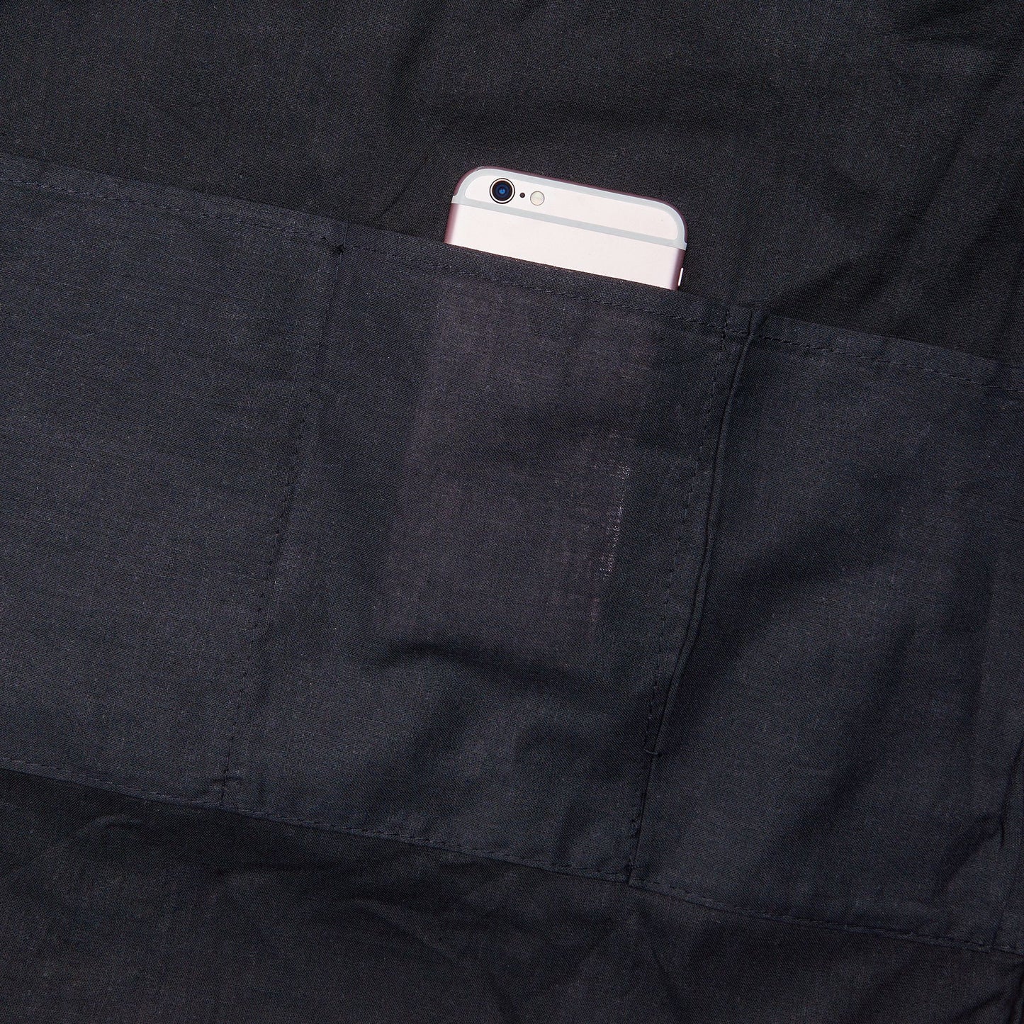 Black interior lining and inner pocket of tennis ball pattern tote bag