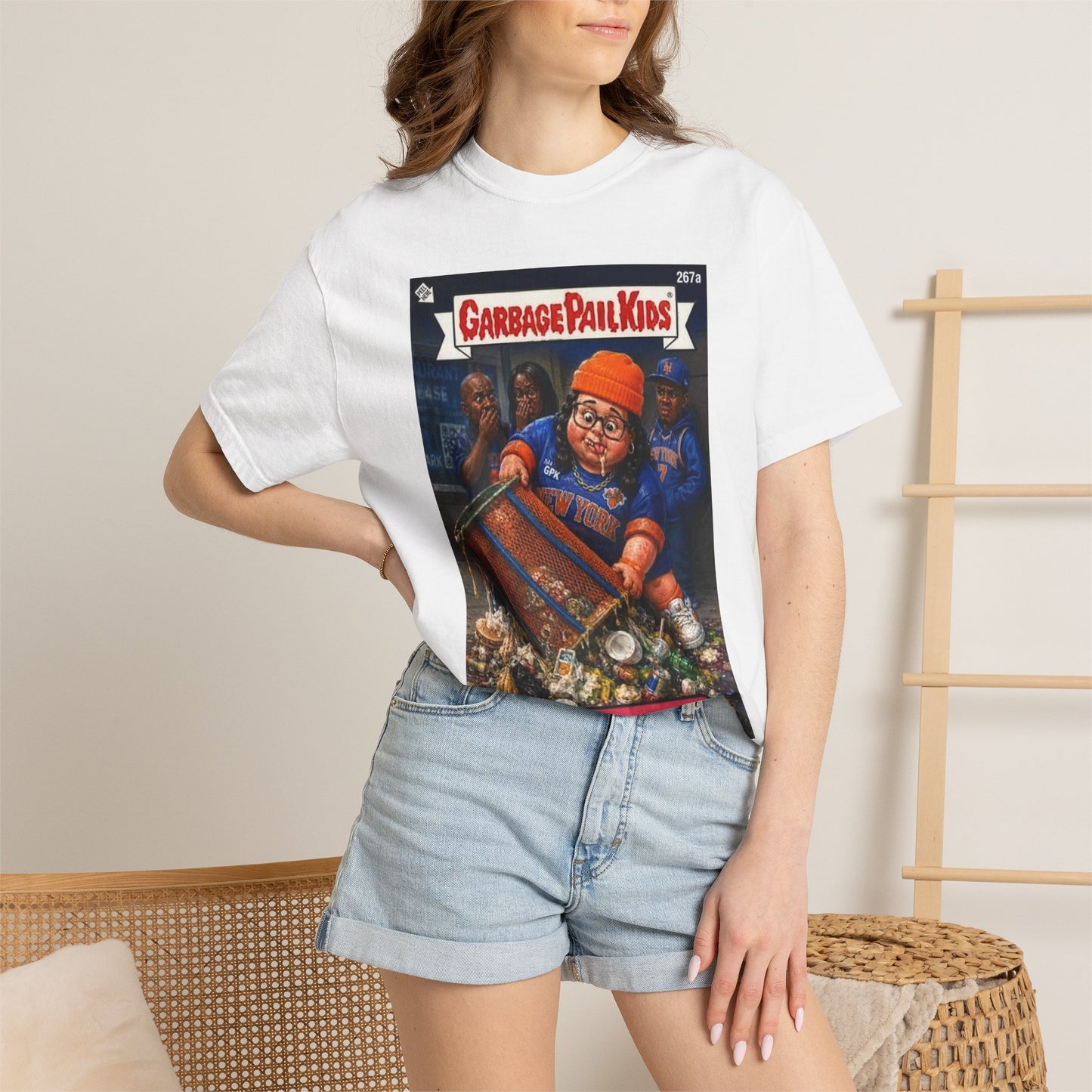 Female model wearing Trashy Trisha Knicks parody t-shirt with denim shorts