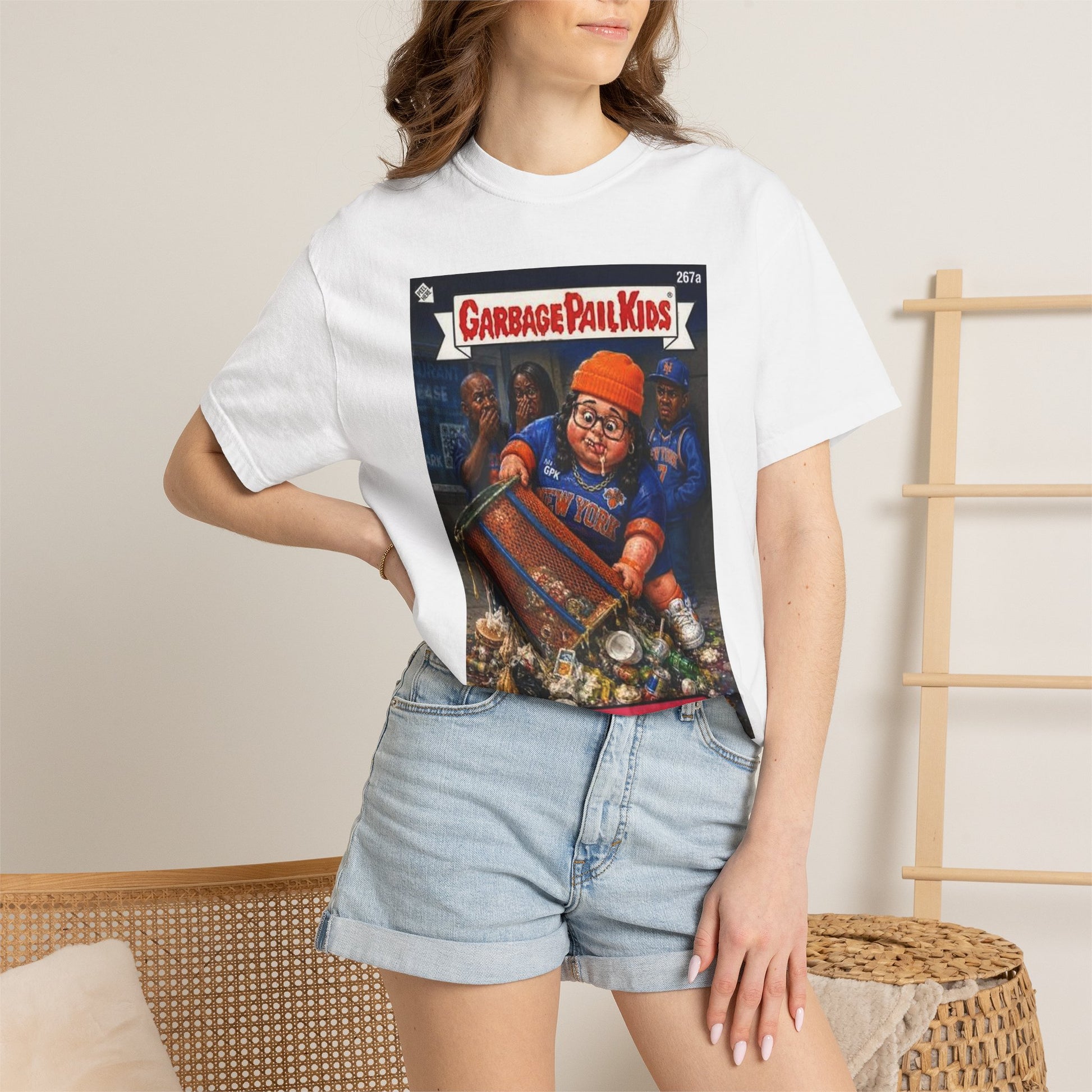 Female model wearing Trashy Trisha Knicks parody t-shirt with denim shorts