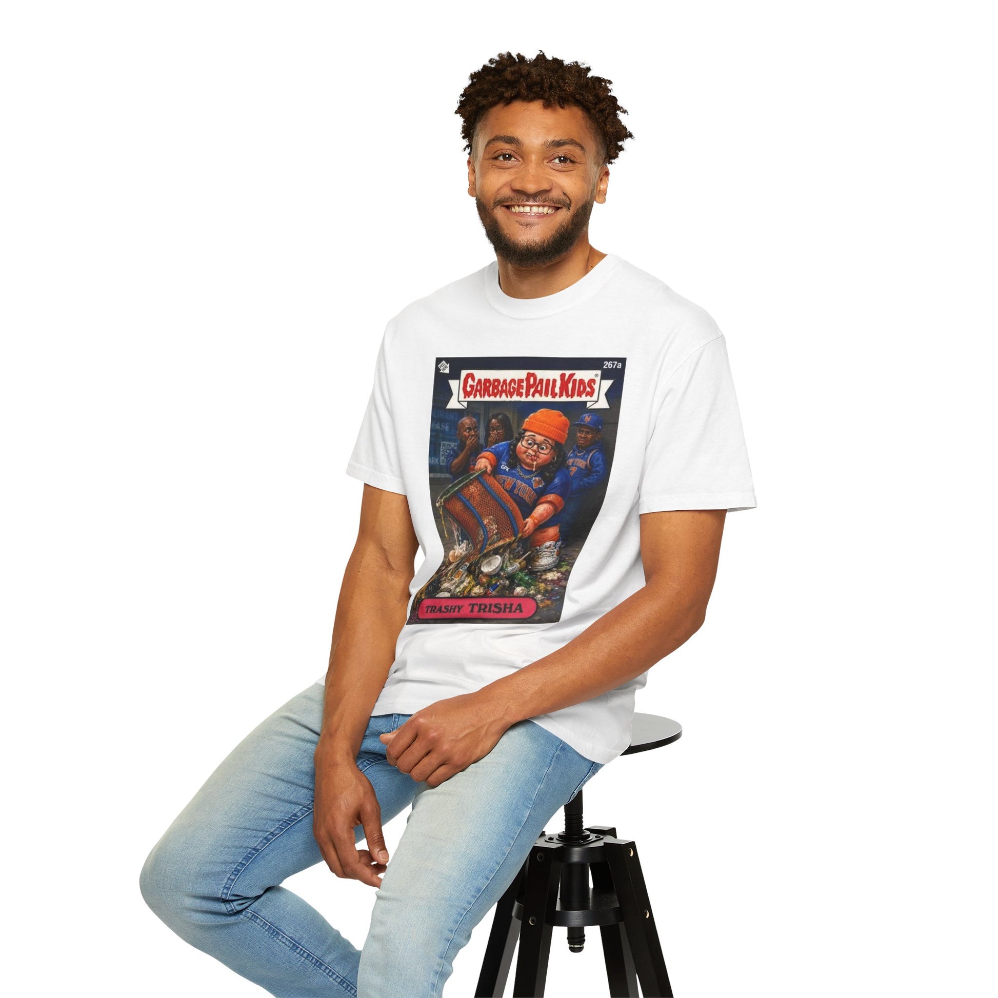 Male model seated wearing Trashy Trisha Garbage Pail Kids parody t-shirt