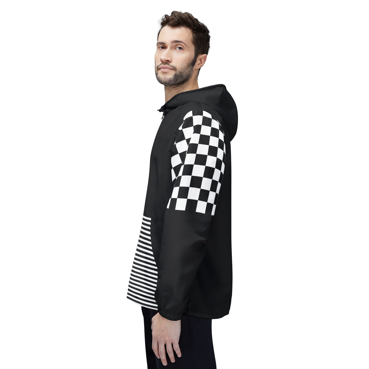 Side view of male model wearing Urban Lines Windbreaker with black and white checkered sleeves