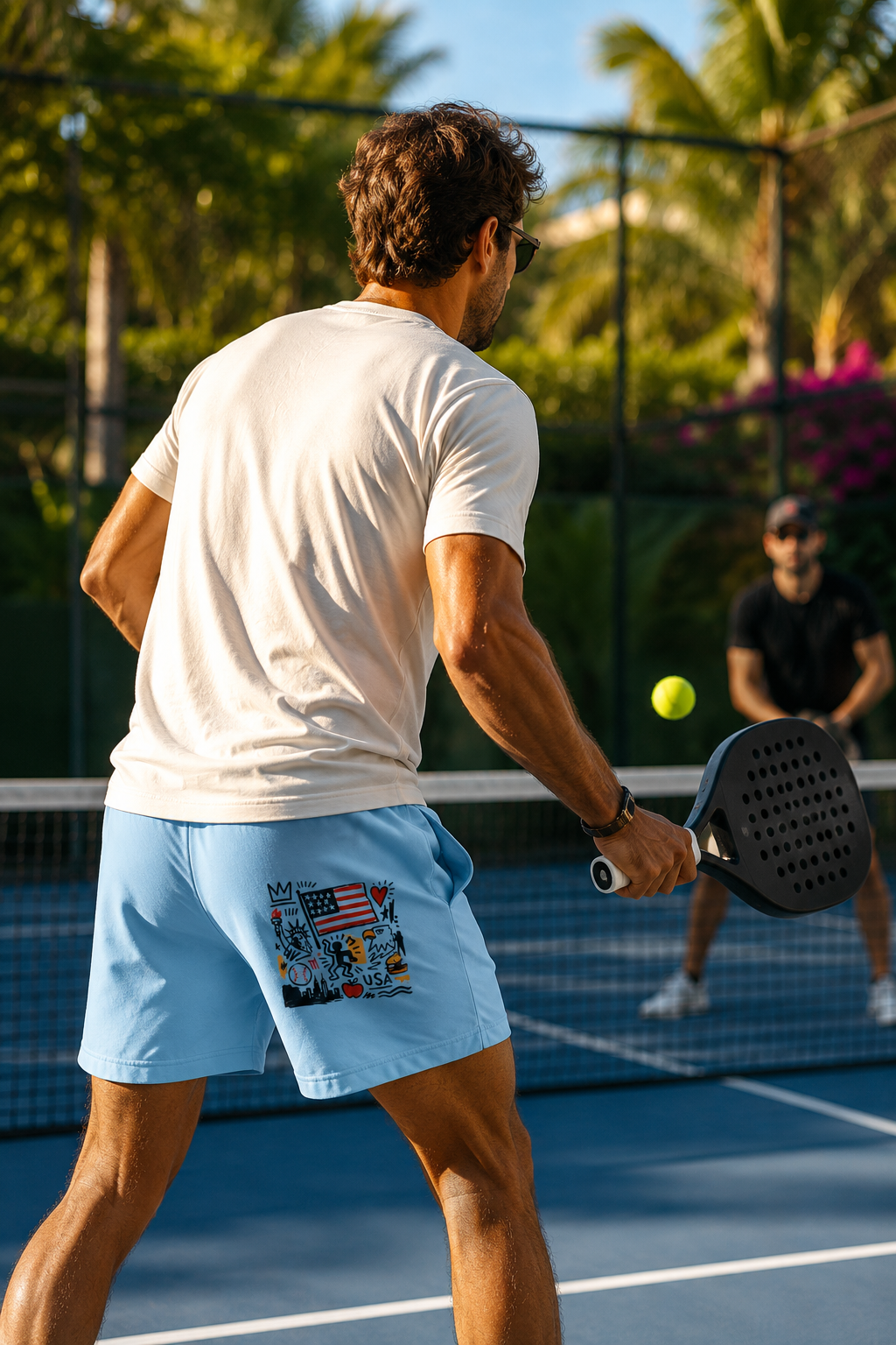 Male model wearing hydrangea blue patriotic shorts on court