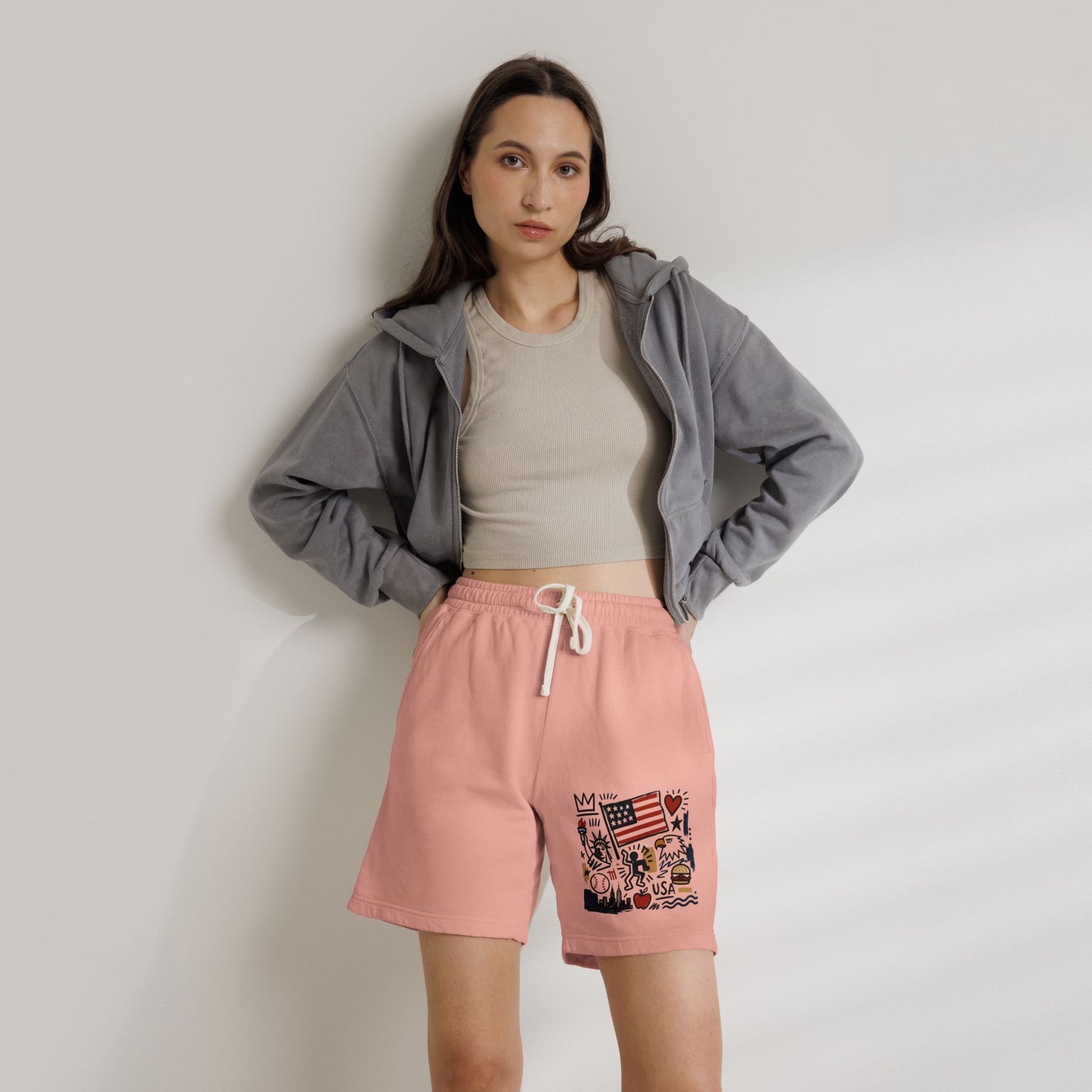 Female model wearing peachy pink USA artsy sweat shorts