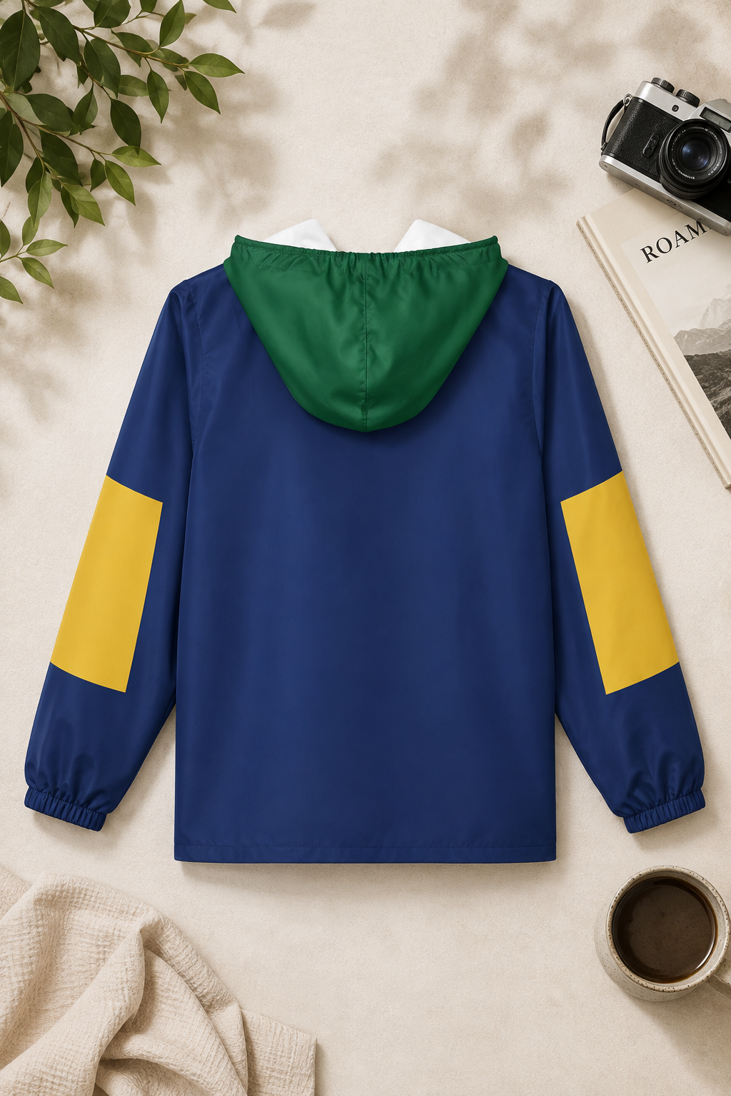 Back view of the Village Windbreaker Jacket in navy, green and yellow
