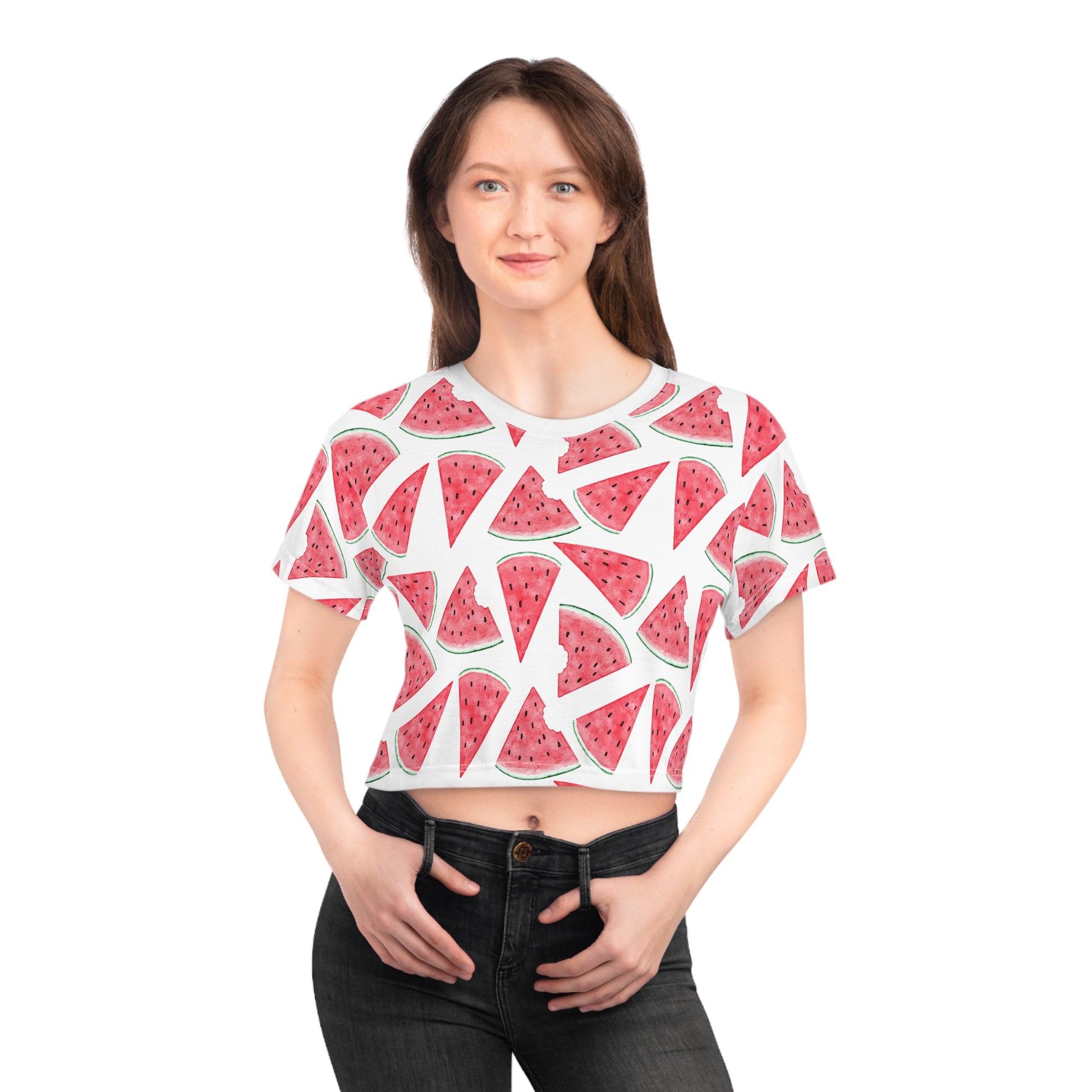 Female model wearing watermelon print crop top with playful summer streetwear styling