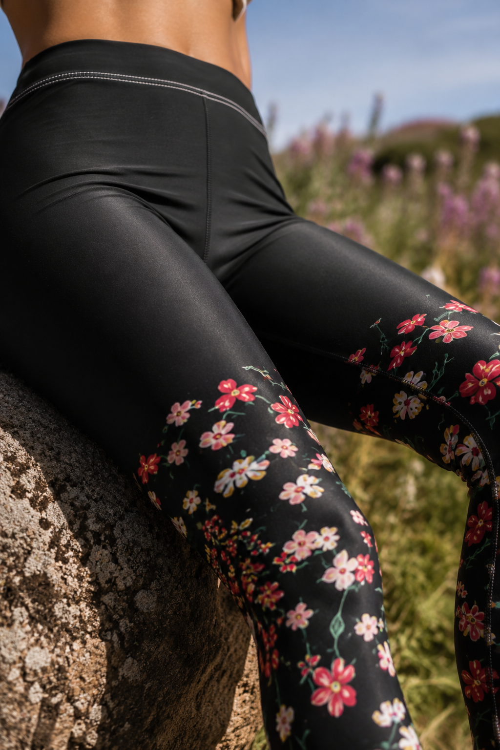 Close-up of Wildflower Floral Yoga Leggings highlighting the brushed suede texture and colorful floral print in a natural outdoor setting.