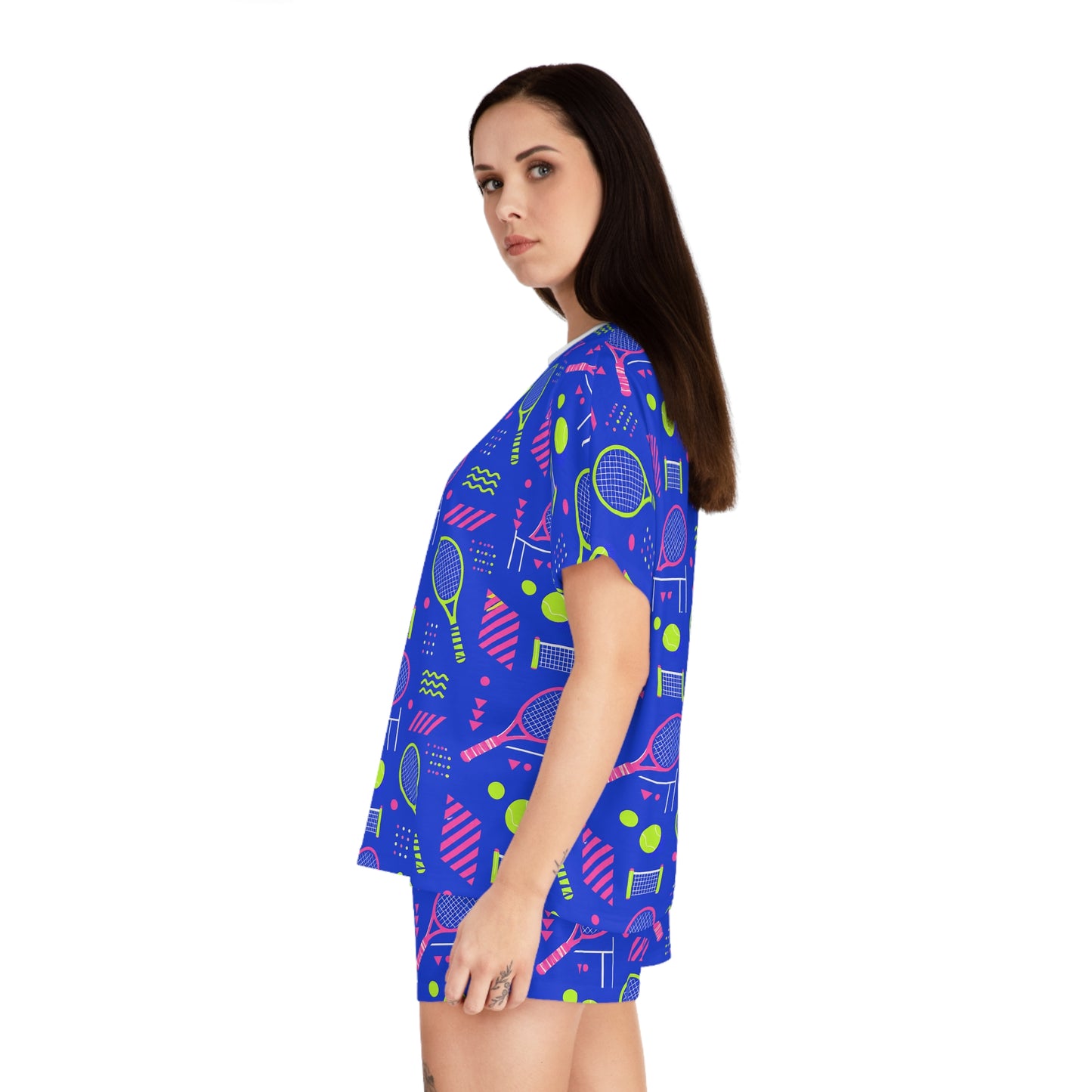 Side view of woman modeling colorful blue tennis short pajama set
