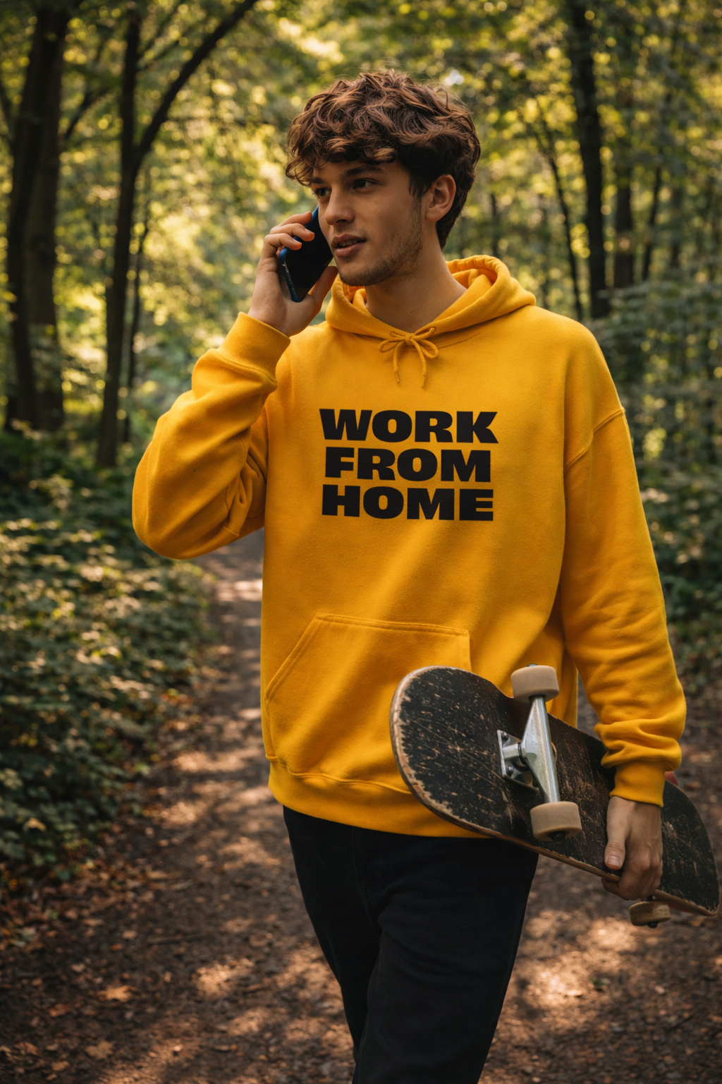 man walking outdoors wearing yellow work from home hoodie casual lifestyle